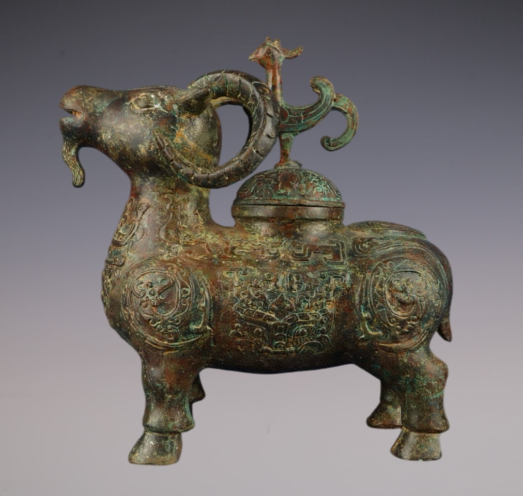 An Exquisite Bronze Beast-Face Pattern Sheep-Shaped Censer: An Exquisite Bronze Beast-Face Pattern Sheep-Shaped Censer W.Zhou , China Size:24cmx11cmx25cm Weight:3100g (The Dimensions Of All Batches Are Manually Measured.If You Need More Detailed