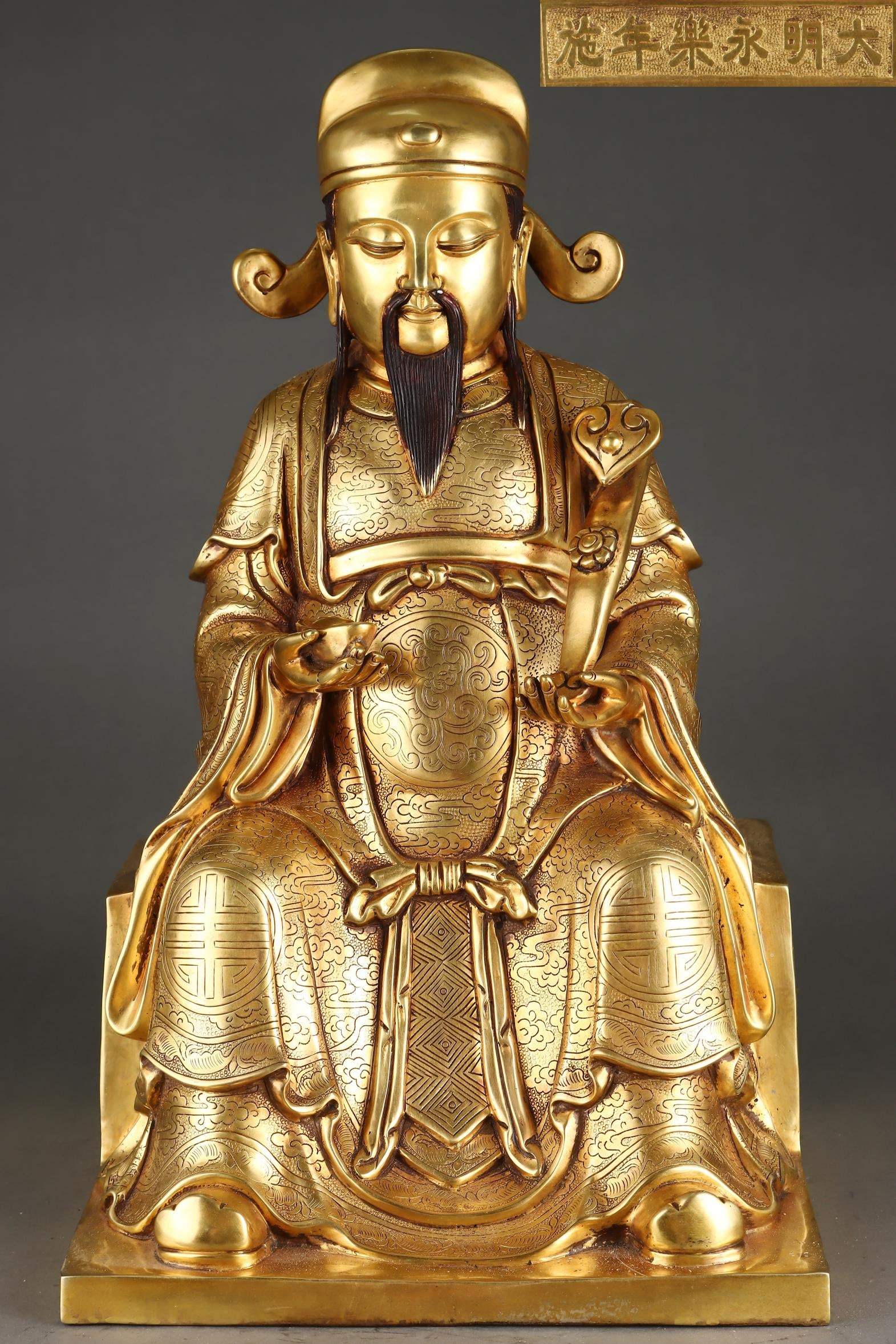 An Exquisite Gilt Bronze Statue of Mammon: An Exquisite Gilt Bronze Statue of Mammon Ming Dynasty, China Yongle Six-character Mark Size:51cmx31cm Weight:23250g (The Dimensions Of All Batches Are Manually Measured.If You Need More Detailed