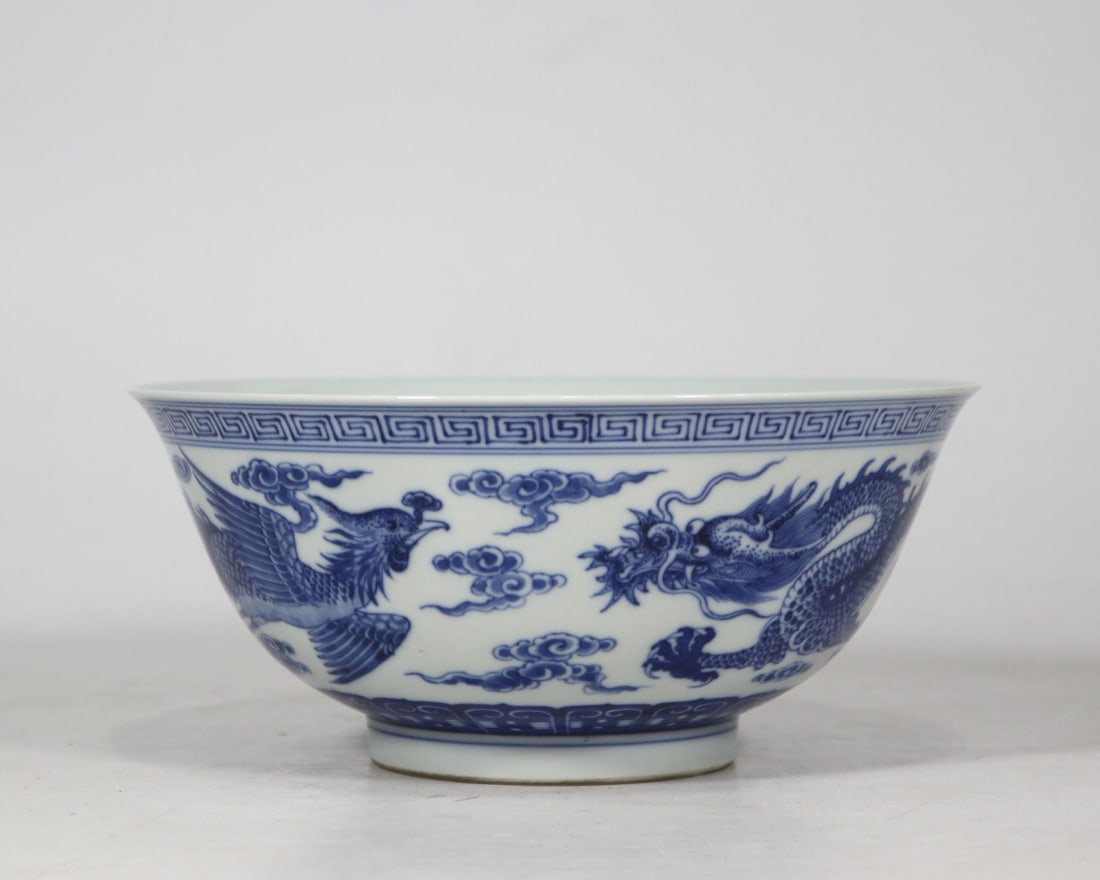 An Exquisite Blue and White Dragon and Phoenix Pattern Bowl: An Exquisite Blue and White Dragon and Phoenix Pattern Bowl Qing Dynasty, China Qianlong Six-character Mark Size:10cmx23cm (The Dimensions Of All Batches Are Manually Measured.If You Need More
