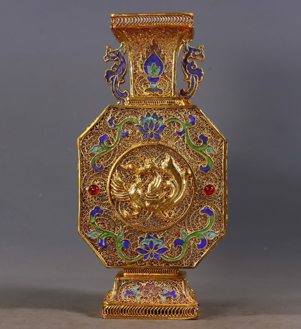An Exquisite Gilt Bronze Inlaid Gems Phoenix Pattern Lotus Pattern Double-Ears Vase: An Exquisite Gilt Bronze Inlaid Gems Phoenix Pattern Lotus Pattern Double-Ears Vase Qing Dynasty, China Qianlong Four-character Mark Size:23.5cmx11.5cmx7cm Weight:626g (The Dimensions Of All Batches A