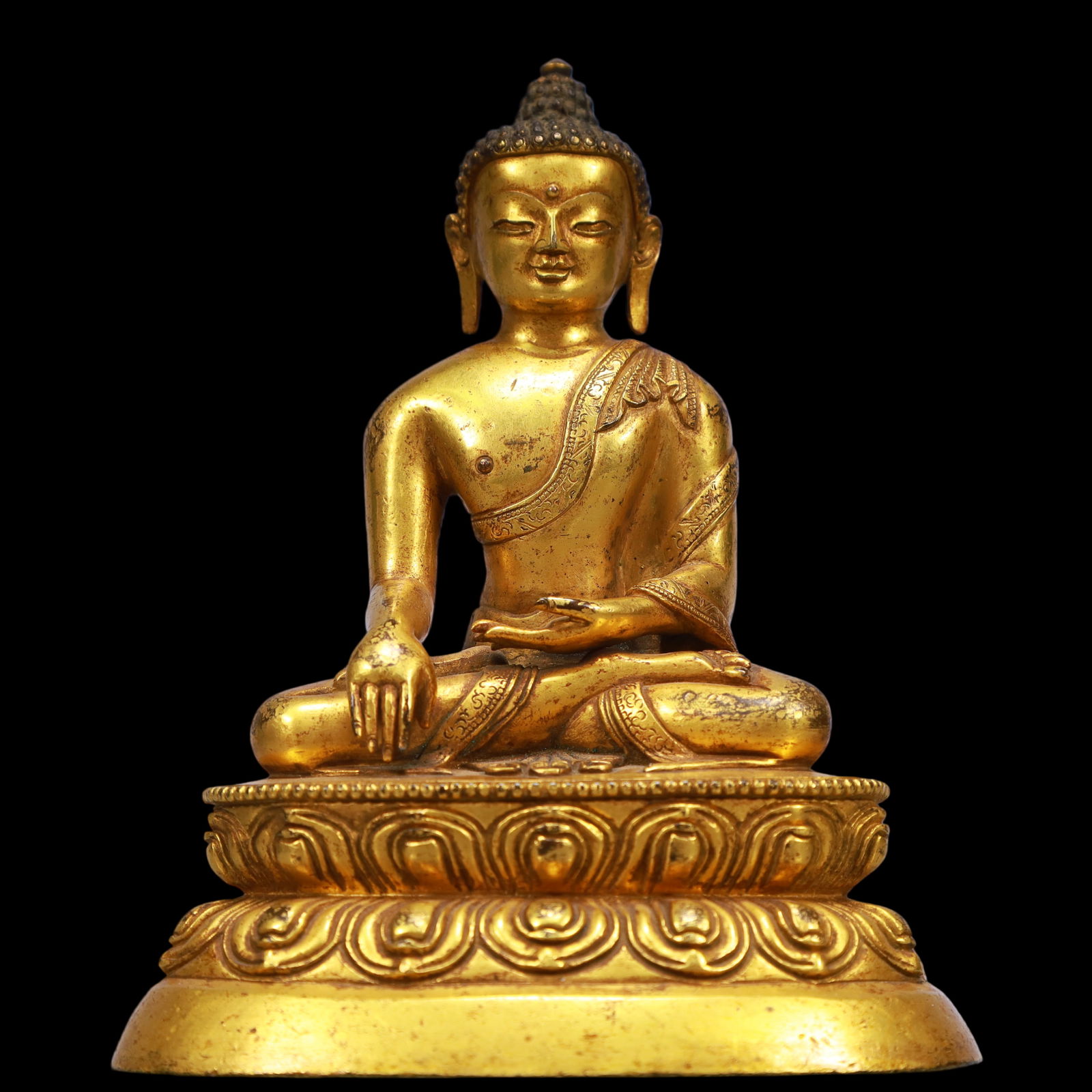 An Exquisite Gilt Bronze Statue of Sakyamuni: An Exquisite Gilt Bronze Statue of Sakyamuni Ming Dynasty, China Size:12cmx8cmx15cm Weight:1000g (The Dimensions Of All Batches Are Manually Measured.If You Need More Detailed Information, Please