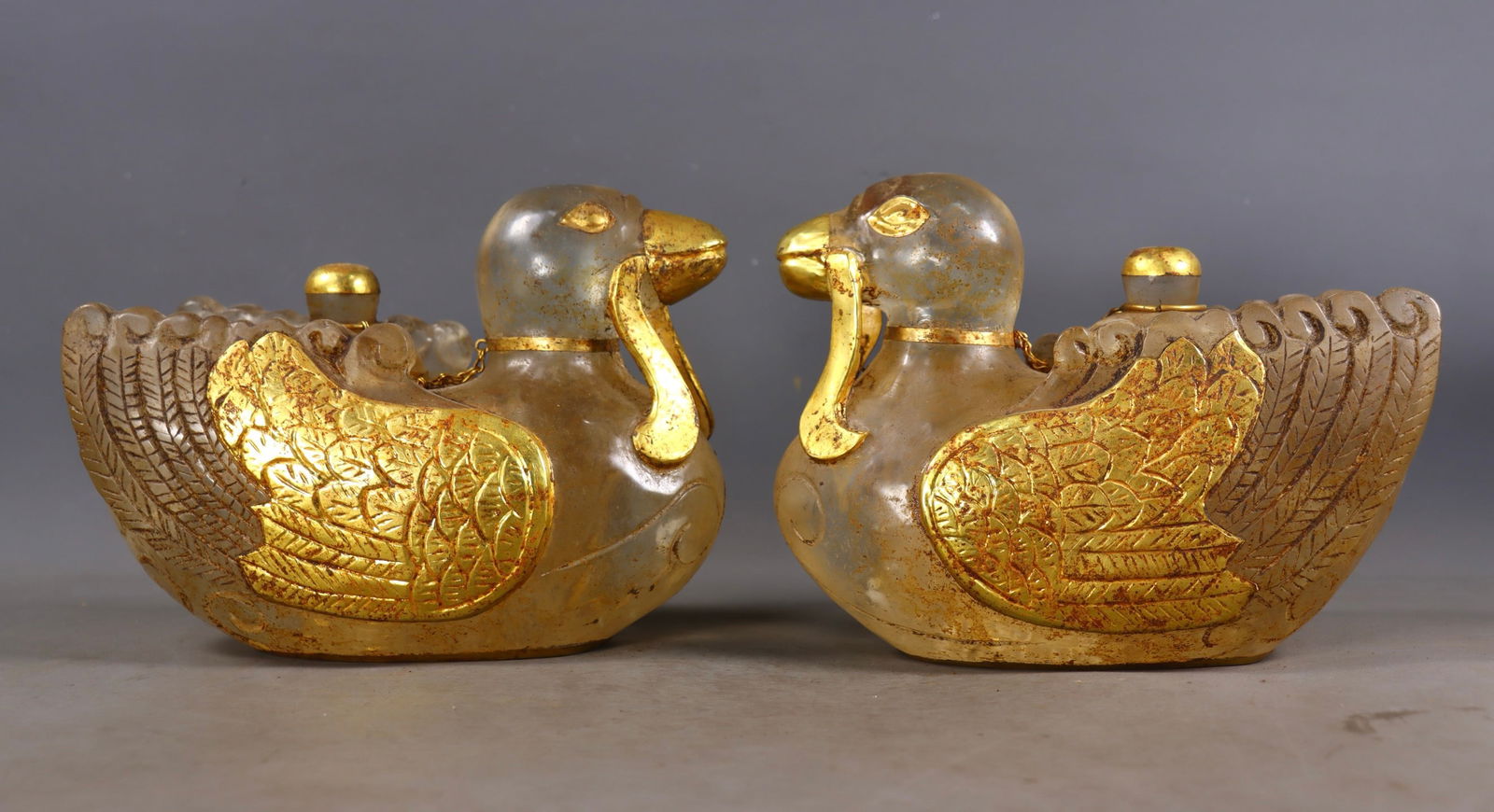 A Pair of Exquisite Crystal Cover with Gold Duck-Shaped Ewer: A Pair of Exquisite Crystal Cover with Gold Duck-Shaped Ewer Liao Dynasty, China Size:15.5cmx19cmx9cm Weight:5950g (The Dimensions Of All Batches Are Manually Measured.If You Need More Detailed