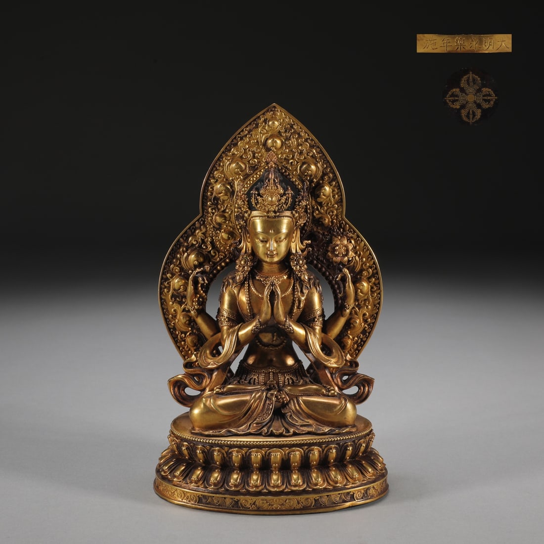 An Exquisite Gilt Bronze Four-arms Statue of Avalokitesvara: An Exquisite Gilt Bronze Four-arms Statue of Avalokitesvara Ming Dynasty, China Yongle Six-character Mark Size:16.5cmx10.5cm Weight:1.35kg (The Dimensions Of All Batches Are Manually Measured.If