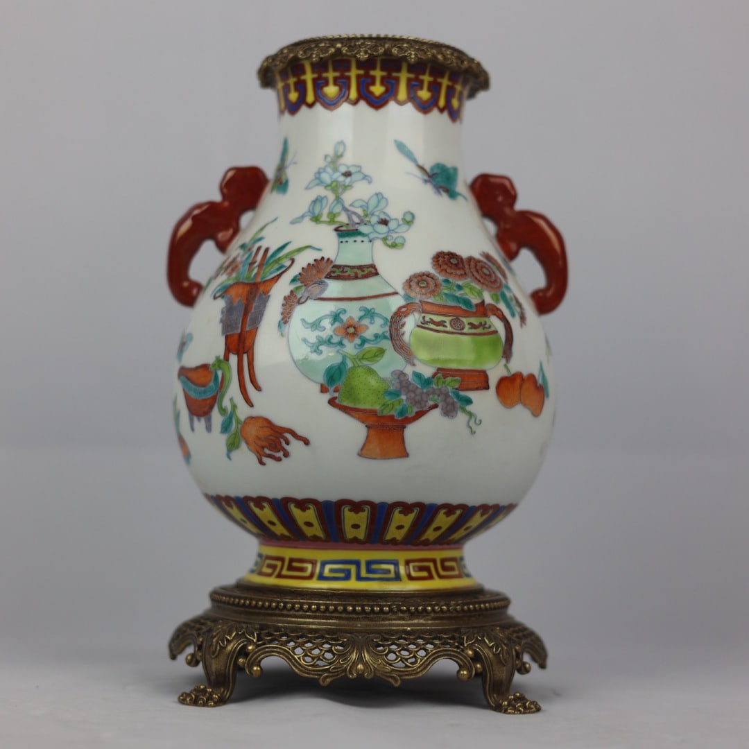 An Exquisite Famille-Rose Inlaid Bronze Flower and Butterfly Pattern Double-Ears Vase: An Exquisite Famille-Rose Inlaid Bronze Flower and Butterfly Pattern Double-Ears Vase Qing Dynasty, China Qianlong Six-character Mark Size:25.5cmx17cm (The Dimensions Of All Batches Are Manually