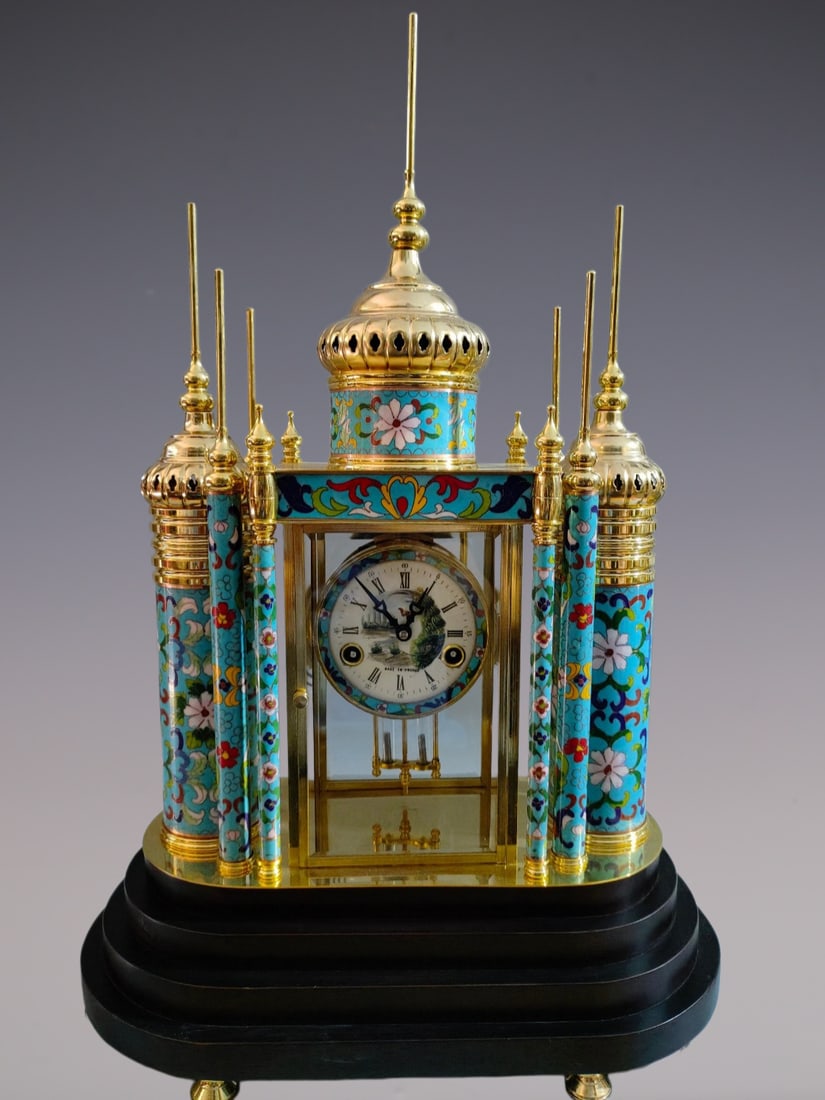 An Exquisite Gilt Bronze Lotus Pattern Clock: An Exquisite Gilt Bronze Lotus Pattern Clock Qing Dynasty, China Size:51cmx30cmx69cm (The Dimensions Of All Batches Are Manually Measured.If You Need More Detailed Information, Please Contact Our