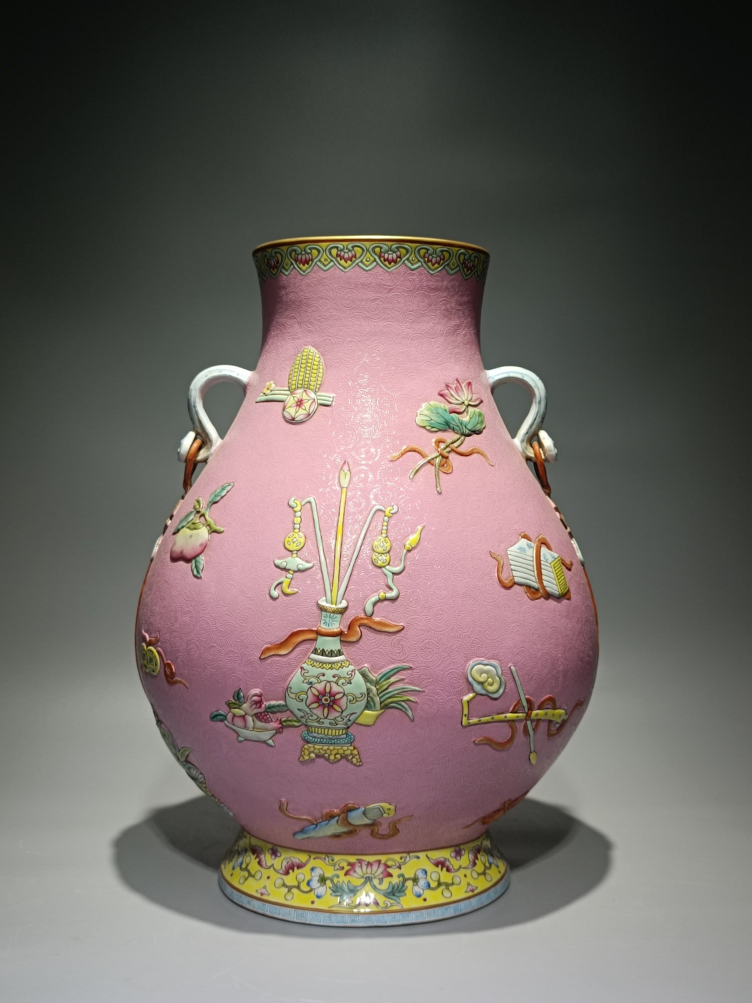 An Exquisite Enamel Lotus Pattern Eight Treasures Pattern Double-Ears Vase: An Exquisite Enamel Lotus Pattern Eight Treasures Pattern Double-Ears Vase Qing Dynasty, China Qianlong Four-character Mark Size:37.6cmx28cm (The Dimensions Of All Batches Are Manually Measured.If