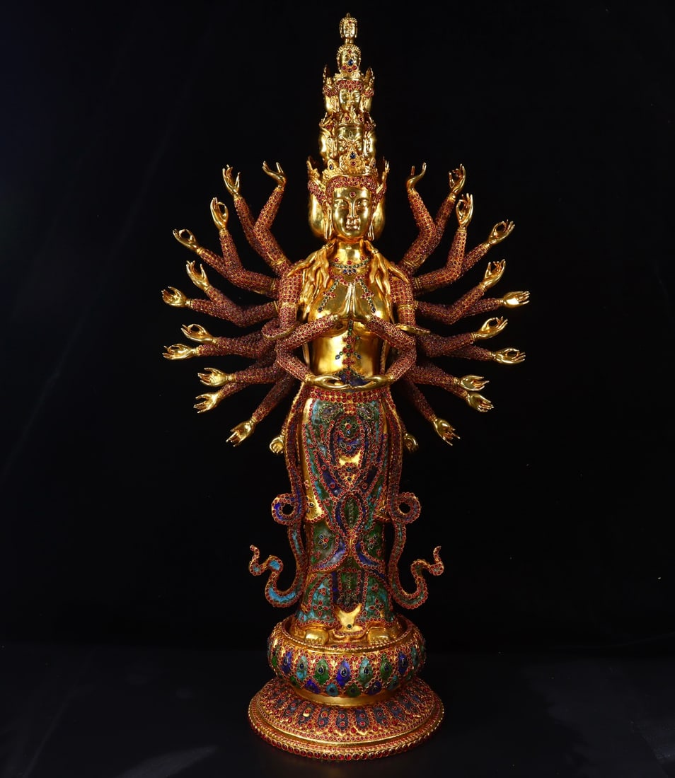 An Exquisite Gilt Bronze Inlaid Gems Statue of Thousand-hand Guanyin: An Exquisite Gilt Bronze Inlaid Gems Statue of Thousand-hand Guanyin Qing Dynasty, China Qianlong Four-character Mark Size:77cmx40cmx22cm Weight:11760g (The Dimensions Of All Batches Are Manually