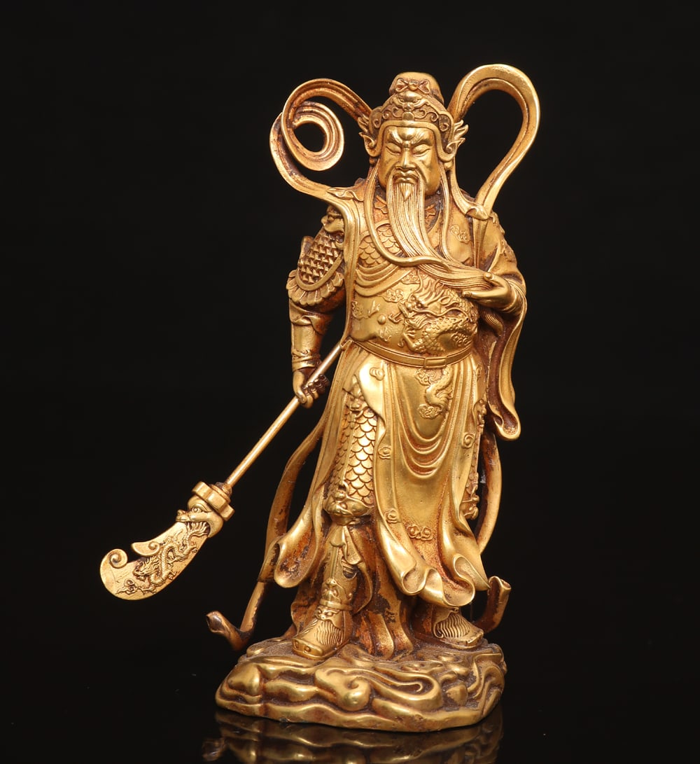 An Exquisite Gilt Bronze Guan yu Ornament: An Exquisite Gilt Bronze Guan yu Ornament Ming Dynasty, China Size:10cmx5cm (The Dimensions Of All Batches Are Manually Measured.If You Need More Detailed Information, Please Contact Our Customer