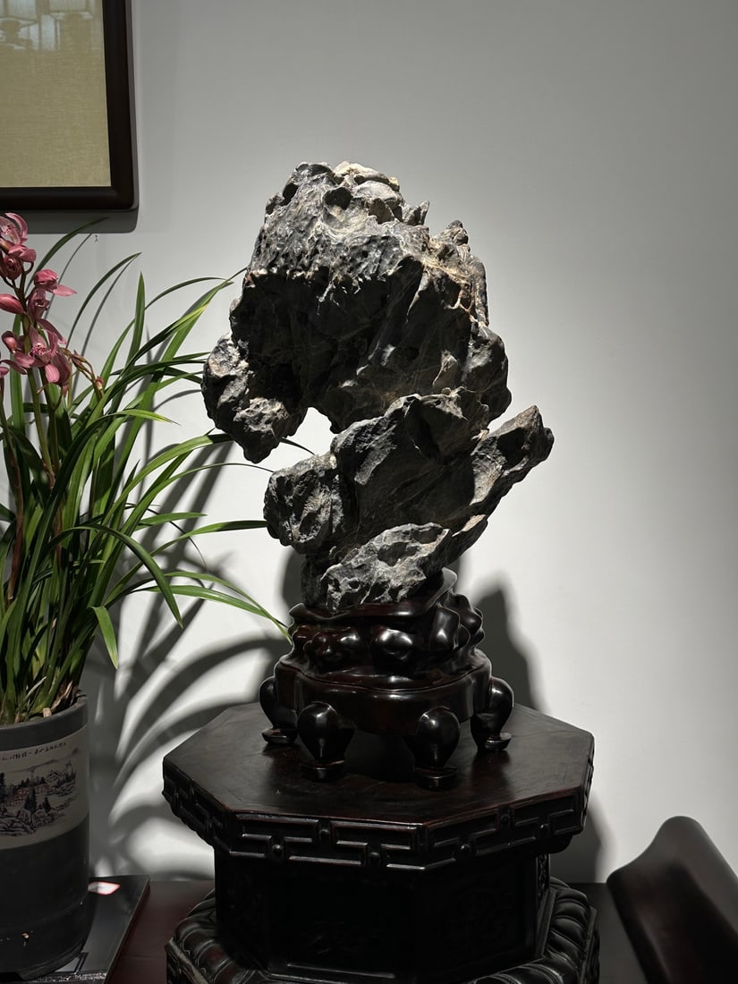 An Exquisite Lingbi Stone Ornament: An Exquisite Lingbi Stone Ornament Qing Dynasty, China Size:52cmx30cmx20cm (The Dimensions Of All Batches Are Manually Measured.If You Need More Detailed Information, Please Contact Our Customer