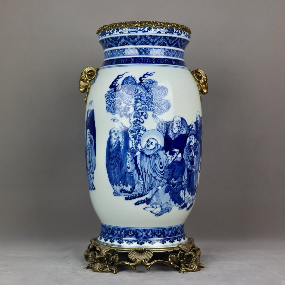 An Exquisite Blue and White Inlaid Bronze Character and Story Pattern Double-Ears Vase: An Exquisite Blue and White Inlaid Bronze Character and Story Pattern Double-Ears Vase Qing Dynasty, China Qianlong Six-character Mark Size:46cmx24cm (The Dimensions Of All Batches Are Manually