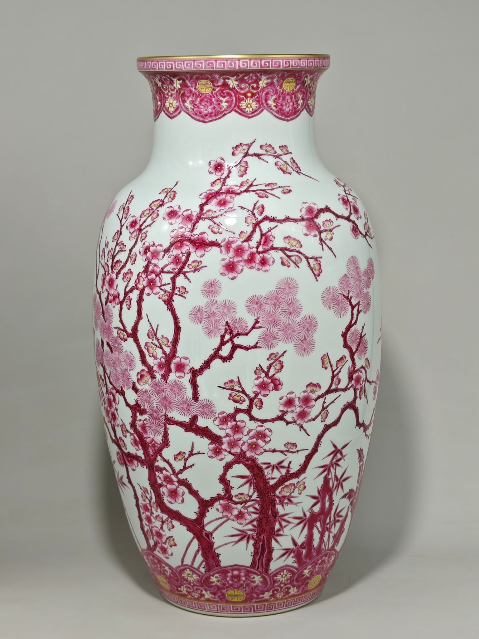 An Exquisite Enamel Ruby Red-Glazed Lotus Pattern Pine, Bamboo and Plum Blossom Pattern Vase: An Exquisite Enamel Ruby Red-Glazed Lotus Pattern Pine, Bamboo and Plum Blossom Pattern Vase Qing Dynasty, China Qianlong Six-character Mark Size:54cmx26cm (The Dimensions Of All Batches Are