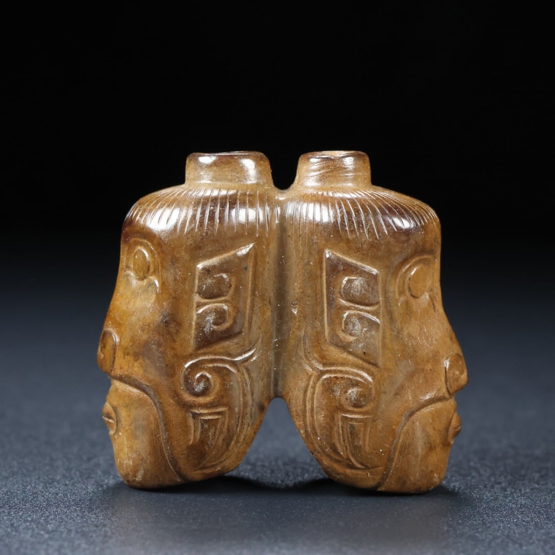 An Exquisite White Jade Head Ornament: An Exquisite White Jade Head Ornament Han Dynasty, China Size:3.9cmx4.3cmx2.1cm Weight:48.7g (The Dimensions Of All Batches Are Manually Measured.If You Need More Detailed Information, Please