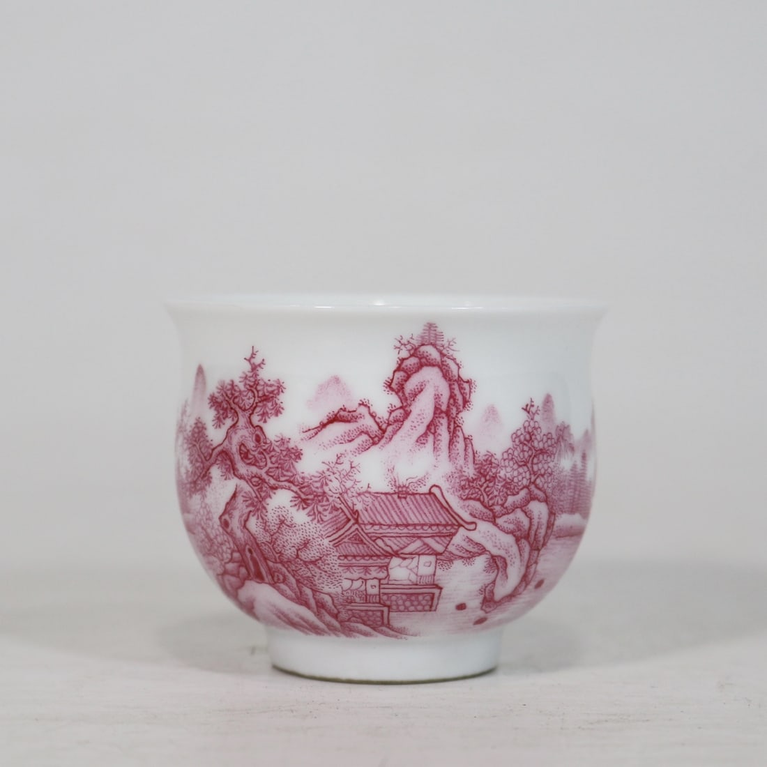 An Exquisite Ruby Red-Glazed Landscape Pattern with poem Cup: An Exquisite Ruby Red-Glazed Landscape Pattern with poem Cup Qing Dynasty, China Yongzheng Four-character Mark Size:6.6cmx5.3cm (The Dimensions Of All Batches Are Manually Measured.If You Need More