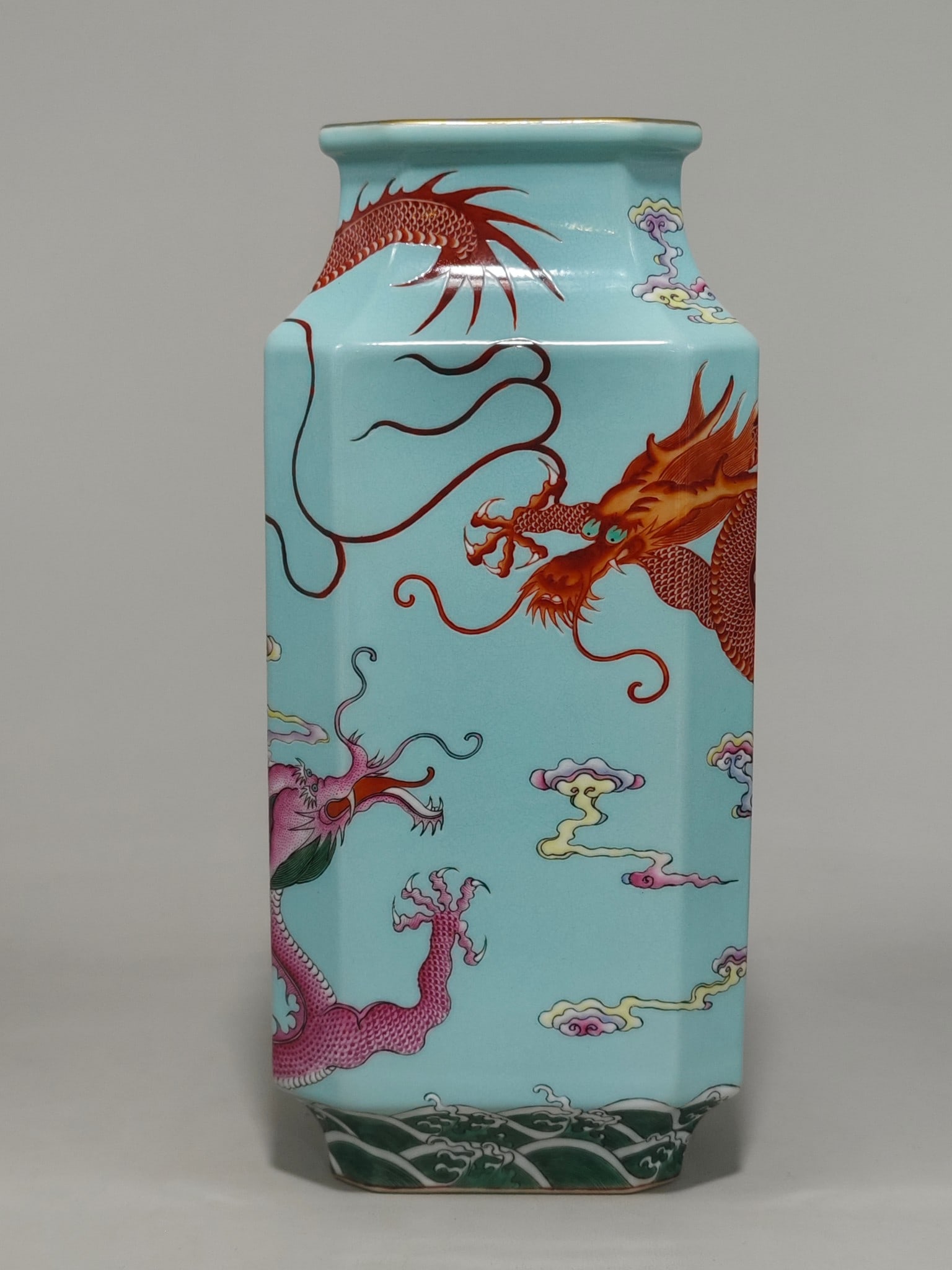 An Exquisite Famille-Rose Green Ground Dragon Pattern Seawater Pattern Vase: An Exquisite Famille-Rose Green Ground Dragon Pattern Seawater Pattern Vase Qing Dynasty, China Qianlong Six-character Mark Size:27.5cmx12.8cm (The Dimensions Of All Batches Are Manually