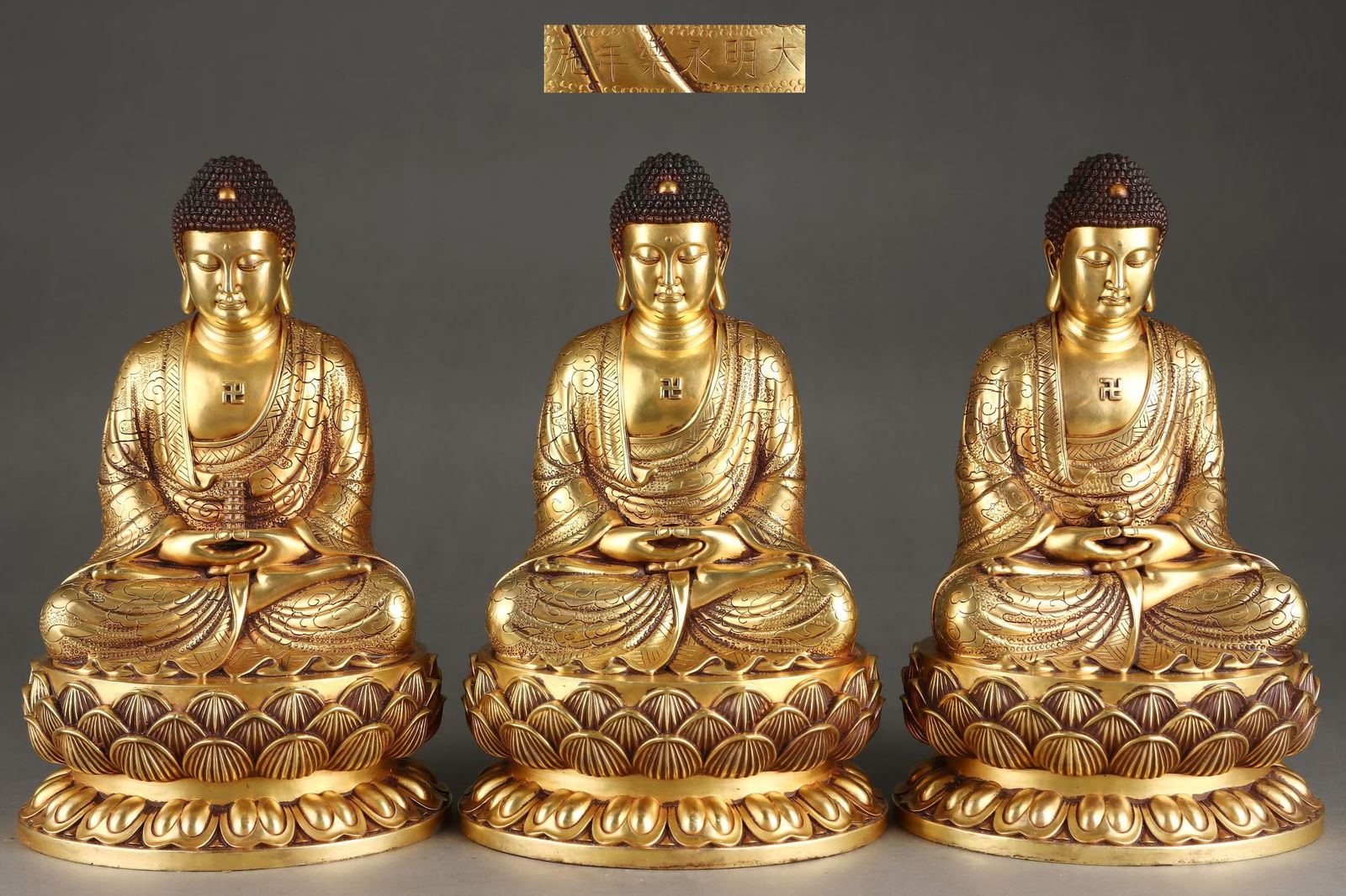 A Set of Fine Gilt Bronze Buddha Statue: A Set of Fine Gilt Bronze Buddha Statue Ming Dynasty, China Yongle Six-character Mark Size:22cmx13.6cm Weight:10850g (The Dimensions Of All Batches Are Manually Measured.If You Need More Detailed