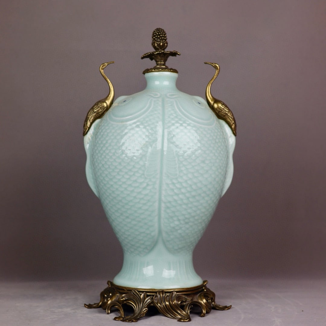 An Exquisite Shadow Blue Glaze Inlaid Bronze Double-Ears Vase: An Exquisite Shadow Blue Glaze Inlaid Bronze Double-Ears Vase Qing Dynasty, China Qianlong Six-character Mark Size:47cmx24cm (The Dimensions Of All Batches Are Manually Measured.If You Need More