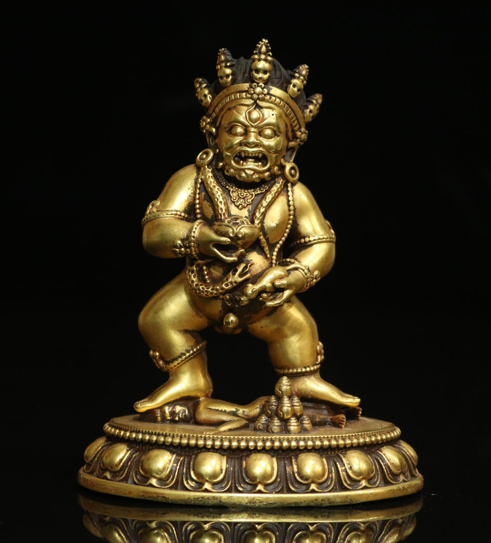 An Exquisite Gilt Bronze Statue of Mammon Ornament: An Exquisite Gilt Bronze Statue of Mammon Ornament Ming Dynasty, China Size:10.5cmx7.5cm Weight:383g (The Dimensions Of All Batches Are Manually Measured.If You Need More Detailed Information,
