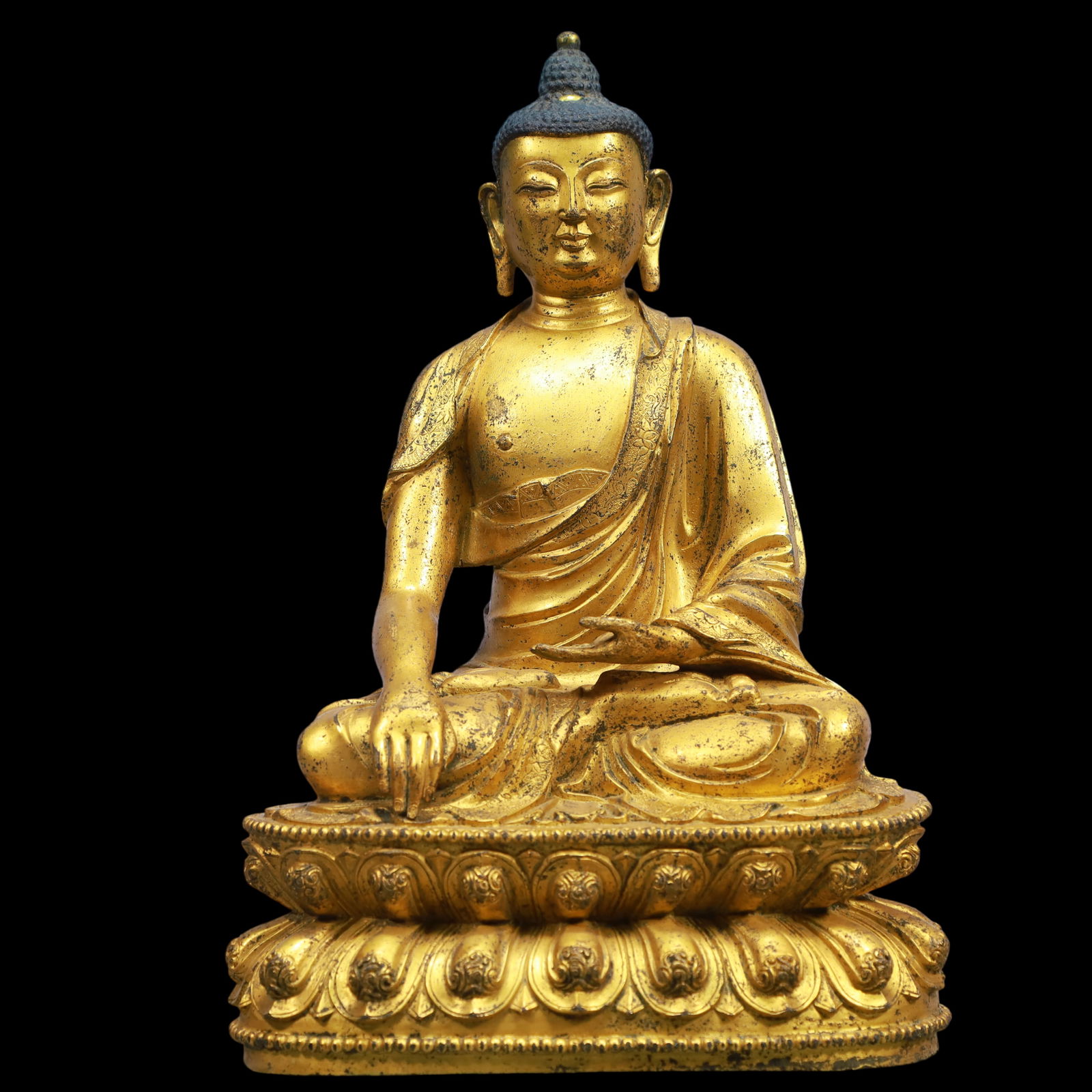 An Exquisite Gilt Bronze Statue of Sakyamuni: An Exquisite Gilt Bronze Statue of Sakyamuni Ming Dynasty, China Size:20cmx14cmx32cm Weight:6250g (The Dimensions Of All Batches Are Manually Measured.If You Need More Detailed Information, Please