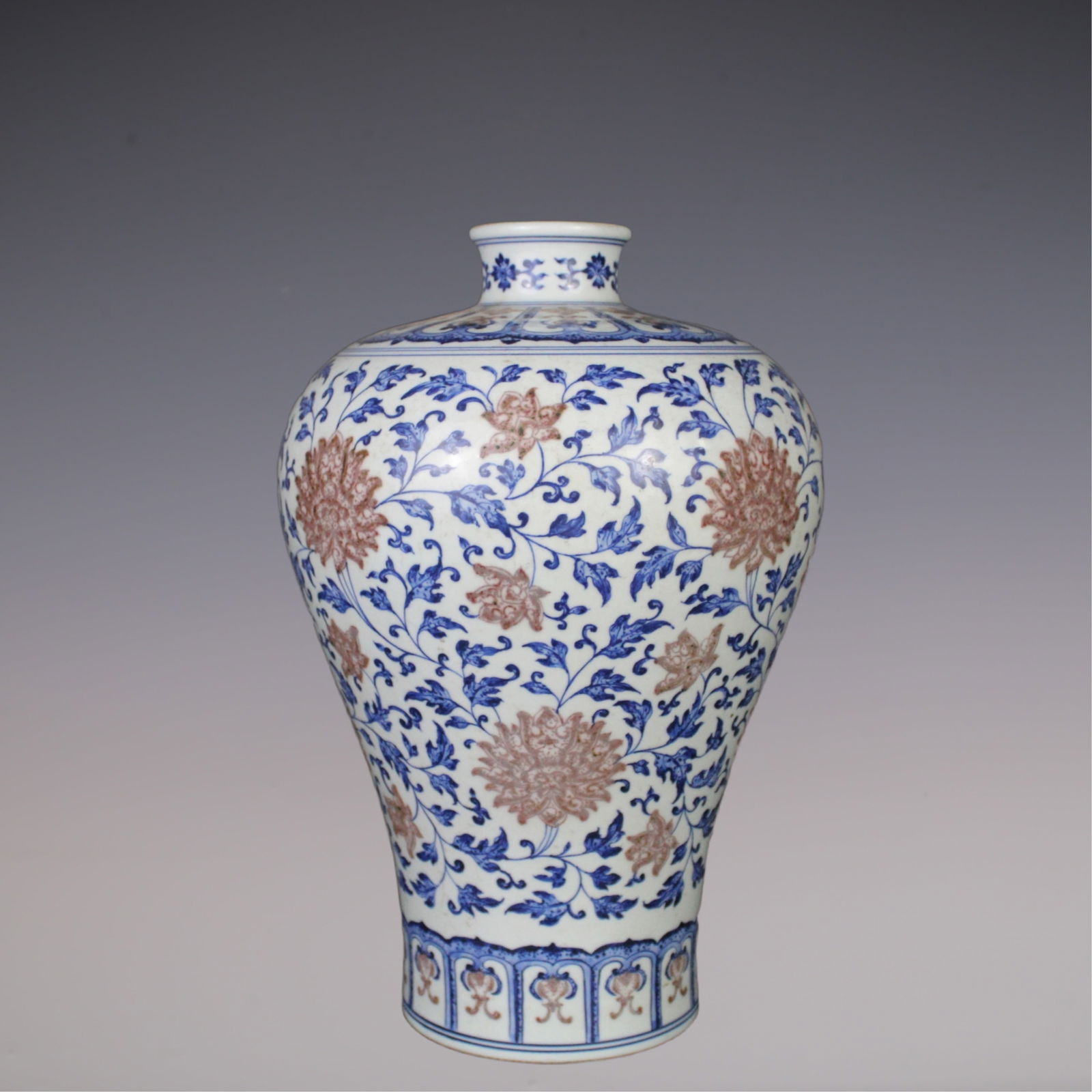 An Exquisite Blue and White Underglaze-Red Lotus Pattern Vase: An Exquisite Blue and White Underglaze-Red Lotus Pattern Vase Qing Dynasty, China Yongzheng Six-character Mark Size:34.5cmx13cm (The Dimensions Of All Batches Are Manually Measured.If You Need More