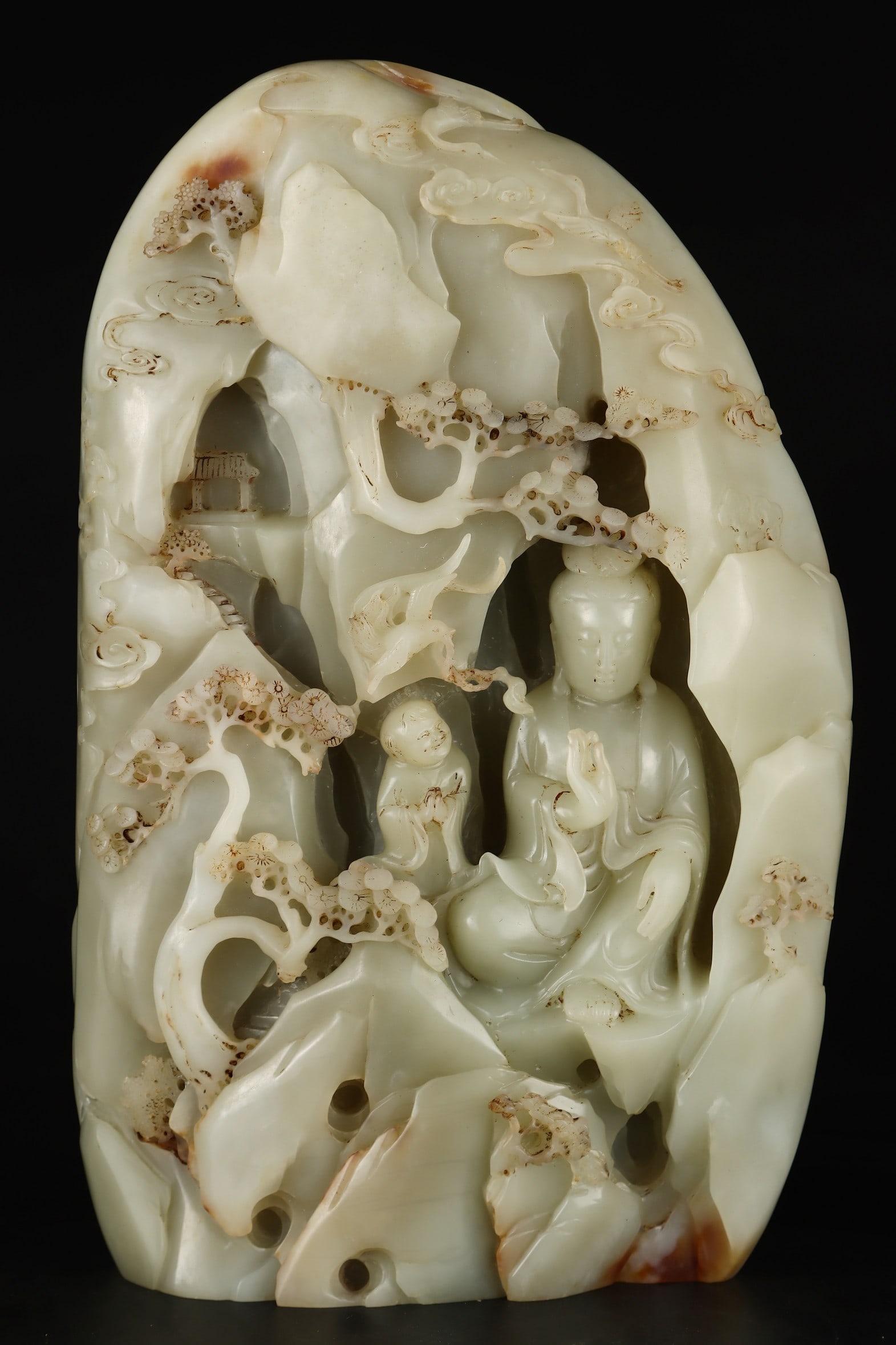 An Exquisite White Jade Statue of Avalokitesvara Rockery Ornament: An Exquisite White Jade Statue of Avalokitesvara Rockery Ornament Qing Dynasty, China Size:37cmx23cmx7cm Weight:13500g (The Dimensions Of All Batches Are Manually Measured.If You Need More Detailed