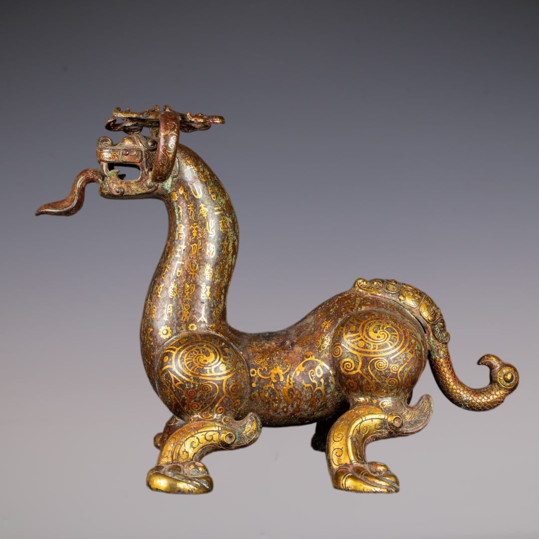 An Exquisite Bronze Inlaid Gold With Inscription Auspicious Beast Ornament: An Exquisite Bronze Inlaid Gold With Inscription Auspicious Beast Ornament Han Dynasty, China Size:80cmx45cmx57cm Weight:15925g (The Dimensions Of All Batches Are Manually Measured.If You Need More
