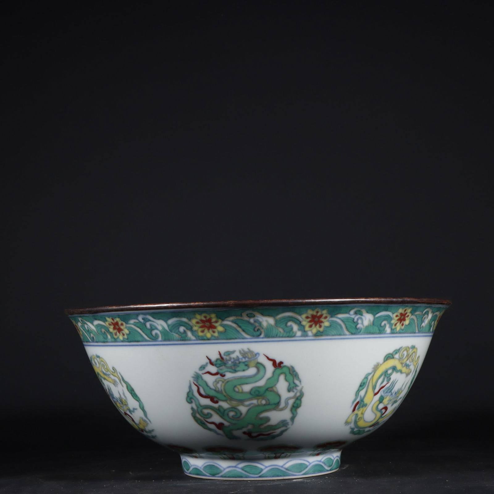 An Exquisite Doucai Seawater Pattern Dragon Pattern Bowl: An Exquisite Doucai Seawater Pattern Dragon Pattern Bowl Ming Dynasty, China Chenghua Six-character Mark Size:9cmx21cm (The Dimensions Of All Batches Are Manually Measured.If You Need More Detailed