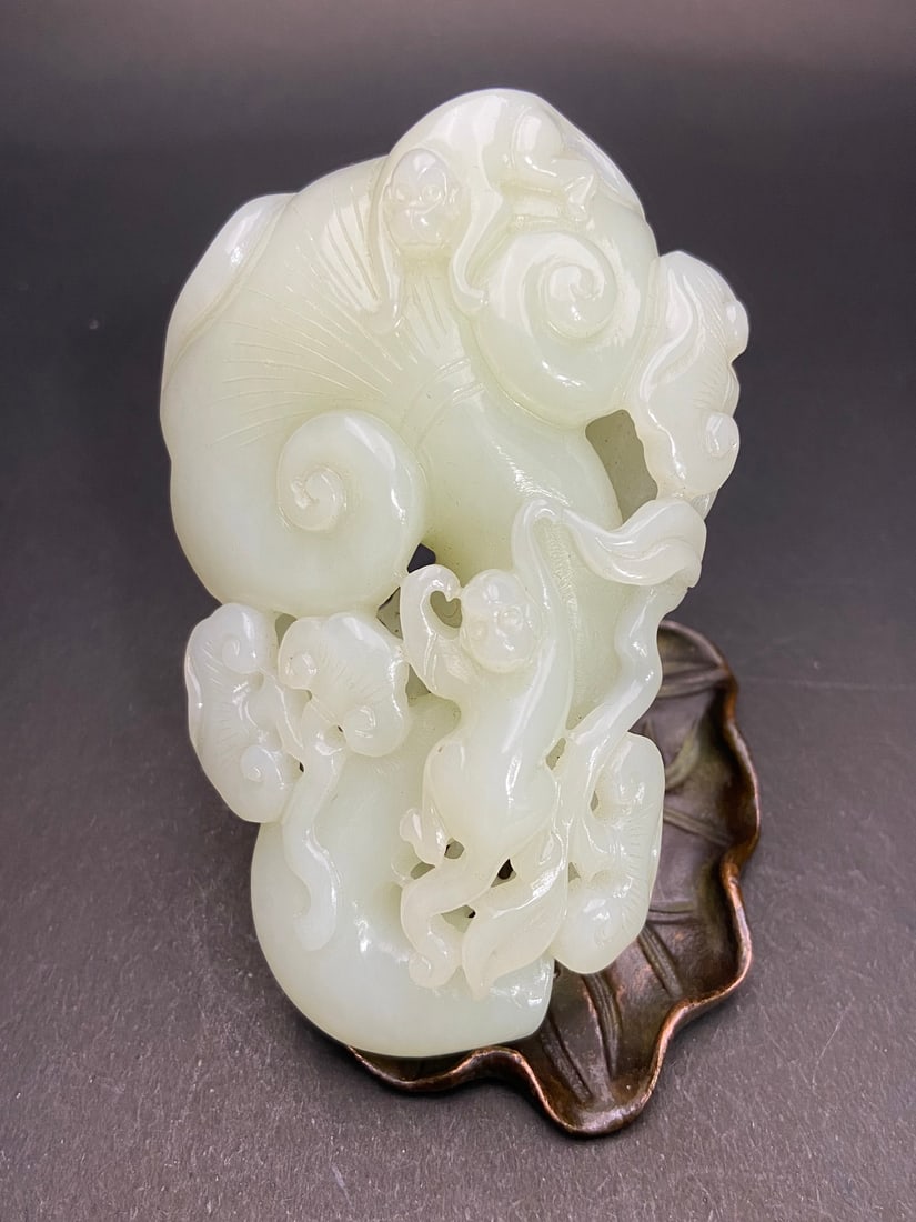 An Exquisite White Jade Ruyi Hand Piece (1 of 9)