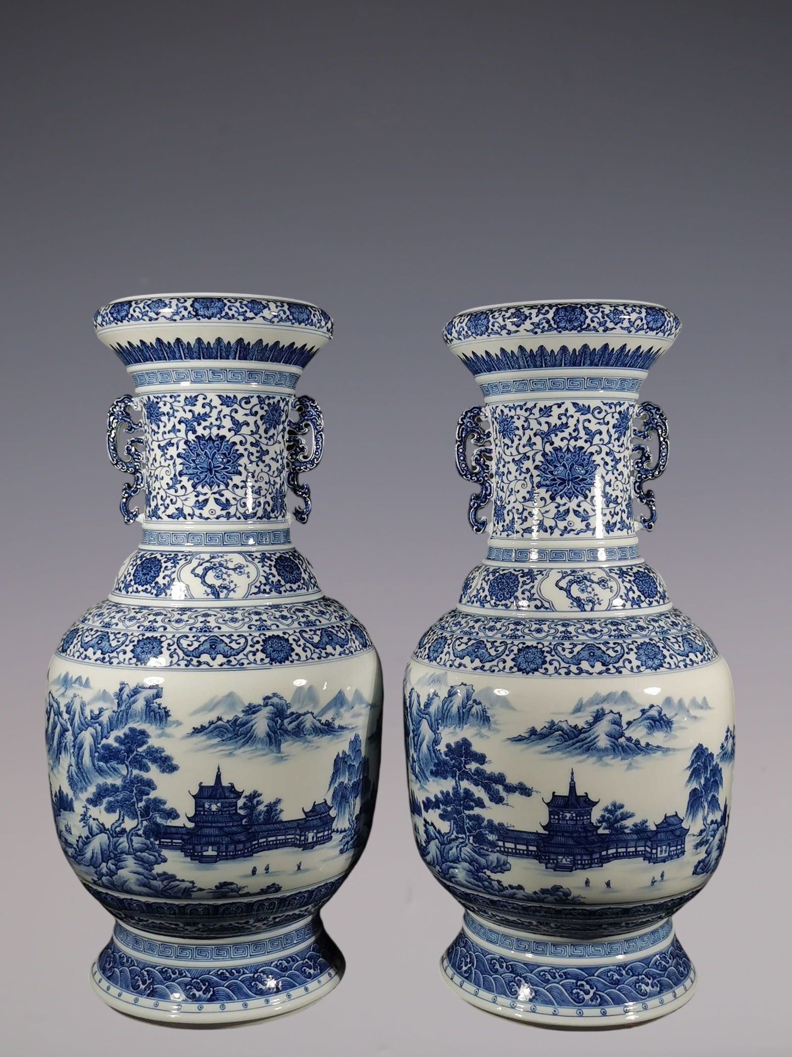An Exquisite Blue and White Lotus Pattern Landscape Pattern Double-Ears Vase: An Exquisite Blue and White Lotus Pattern Landscape Pattern Double-Ears Vase Qing Dynasty, China Qianlong Six-character Mark Size:62.5cmx30.5cm (The Dimensions Of All Batches Are Manually