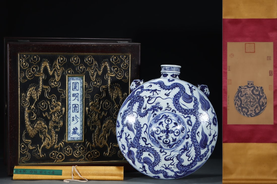 An Exquisite Blue and White Dragon Pattern Double-Ears Vase: An Exquisite Blue and White Dragon Pattern Double-Ears Vase Yuan Dynasty, China Without frame Size:62.5cmx35cm Size:43.7cmx38.7cm (The Dimensions Of All Batches Are Manually Measured.If You Need