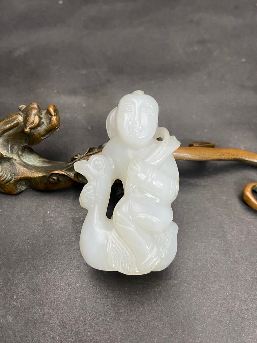 An Exquisite White Jade Figure Pendant: An Exquisite White Jade Figure Pendant Qing Dynasty, China Size:6cmx3.65cmx2.28cm Weight:59g (The Dimensions Of All Batches Are Manually Measured.If You Need More Detailed Information, Please