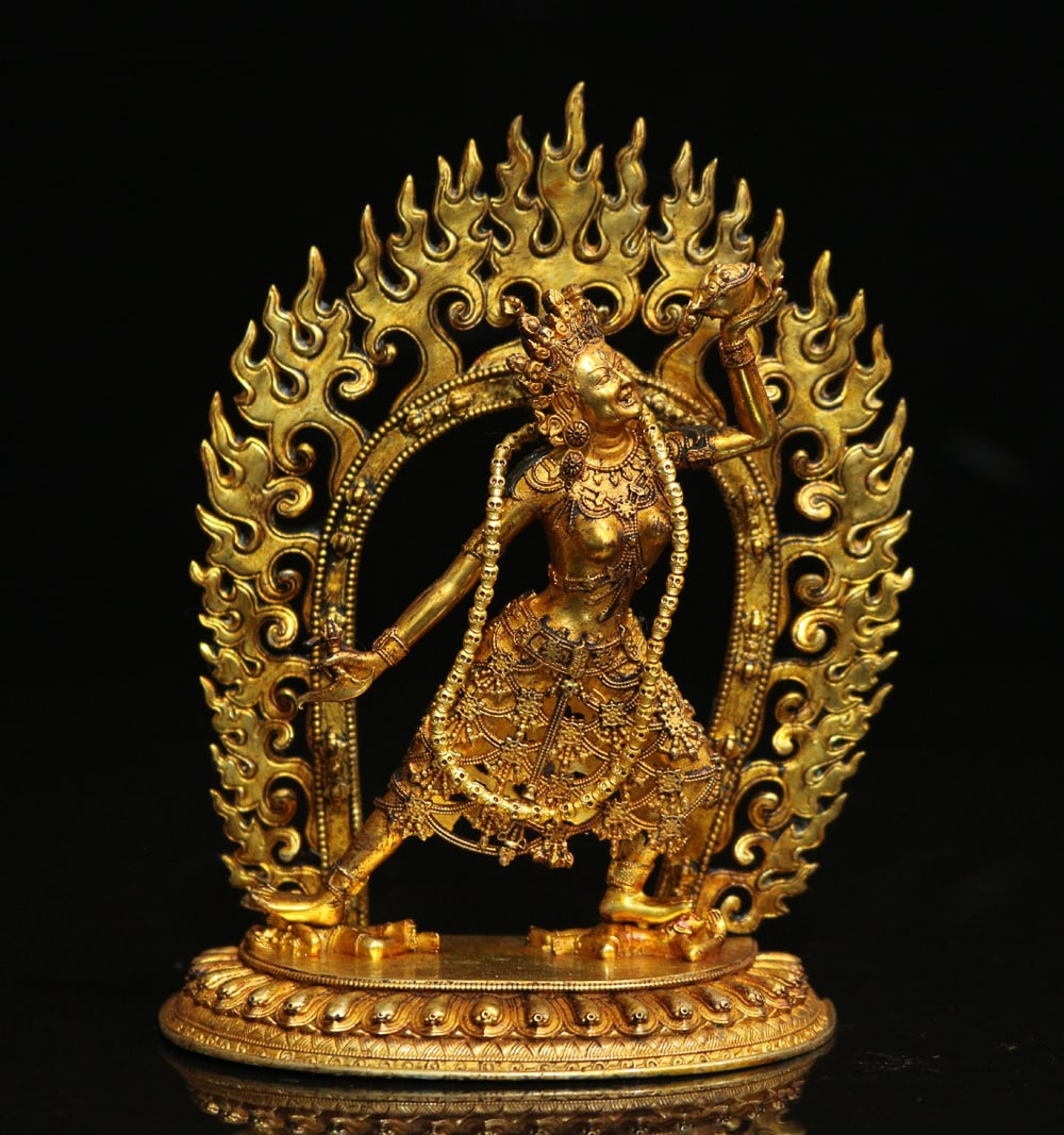 An Exquisite Gilt Bronze Statue of Dakini Ornament: An Exquisite Gilt Bronze Statue of Dakini Ornament Ming Dynasty, China Size:12.5cmx9.5cm Weight:340g (The Dimensions Of All Batches Are Manually Measured.If You Need More Detailed Information,
