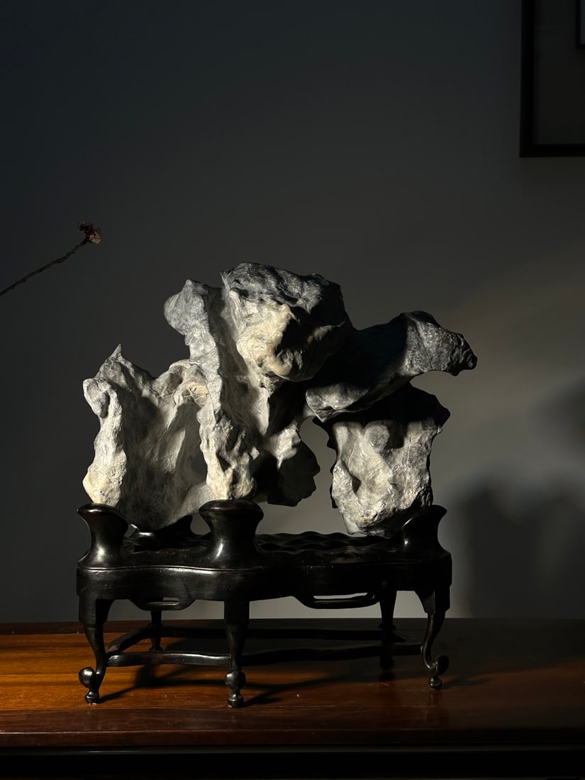 An Exquisite Lingbi Stone Ornament: An Exquisite Lingbi Stone Ornament Qing Dynasty, China Size:47cmx45cmx22cm (The Dimensions Of All Batches Are Manually Measured.If You Need More Detailed Information, Please Contact Our Customer