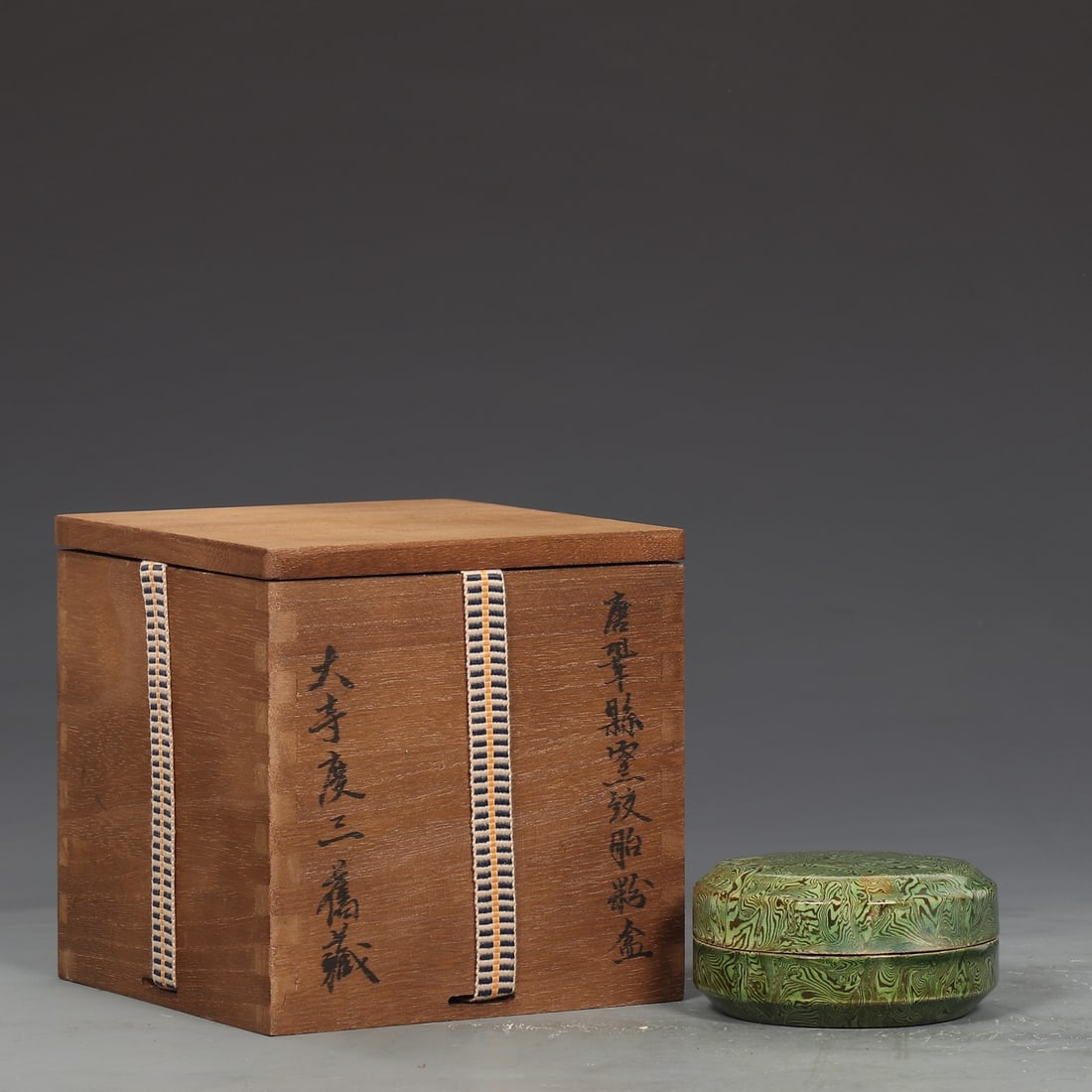 An Exquisite Gongxian yao Green Glazed Box: An Exquisite Gongxian yao Green Glazed Box Tang Dynasty, China Size:4.5cmx8.8cm (The Dimensions Of All Batches Are Manually Measured.If You Need More Detailed Information, Please Contact Our Customer