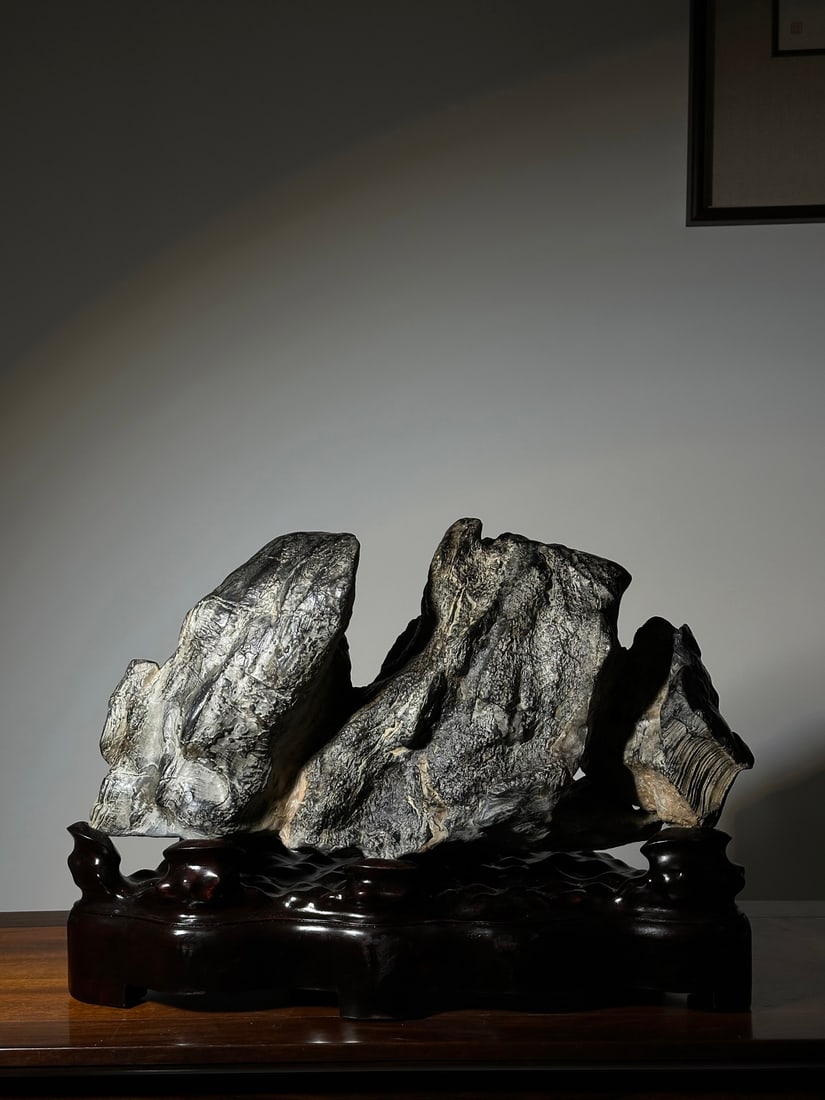 An Exquisite Lingbi Stone Rockery Ornament: An Exquisite Lingbi Stone Rockery Ornament Qing Dynasty, China Size:60cmx42cmx30cm (The Dimensions Of All Batches Are Manually Measured.If You Need More Detailed Information, Please Contact Our