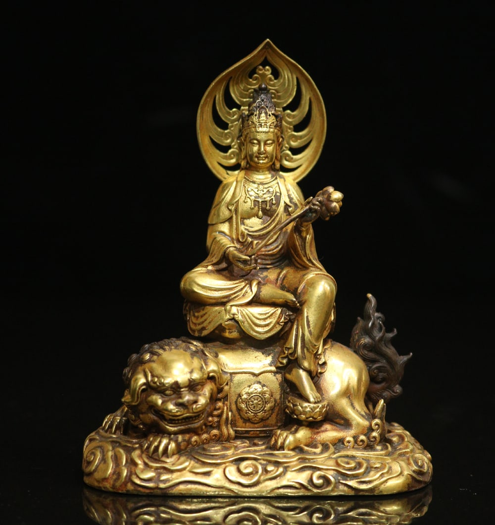 An Exquisite Gilt Bronze Statue of Manjusri Ornament: An Exquisite Gilt Bronze Statue of Manjusri Ornament Ming Dynasty, China Size:11cmx8cm Weight:409g (The Dimensions Of All Batches Are Manually Measured.If You Need More Detailed Information, Please