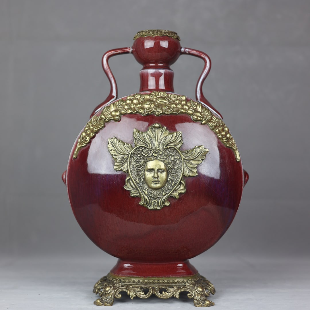 An Exquisite Lang yao Red Glazed Inlaid Bronze Double-Ears Vase: An Exquisite Lang yao Red Glazed Inlaid Bronze Double-Ears Vase Qing Dynasty, China Yongzheng Six-character Mark Size:40cmx27cm (The Dimensions Of All Batches Are Manually Measured.If You Need More