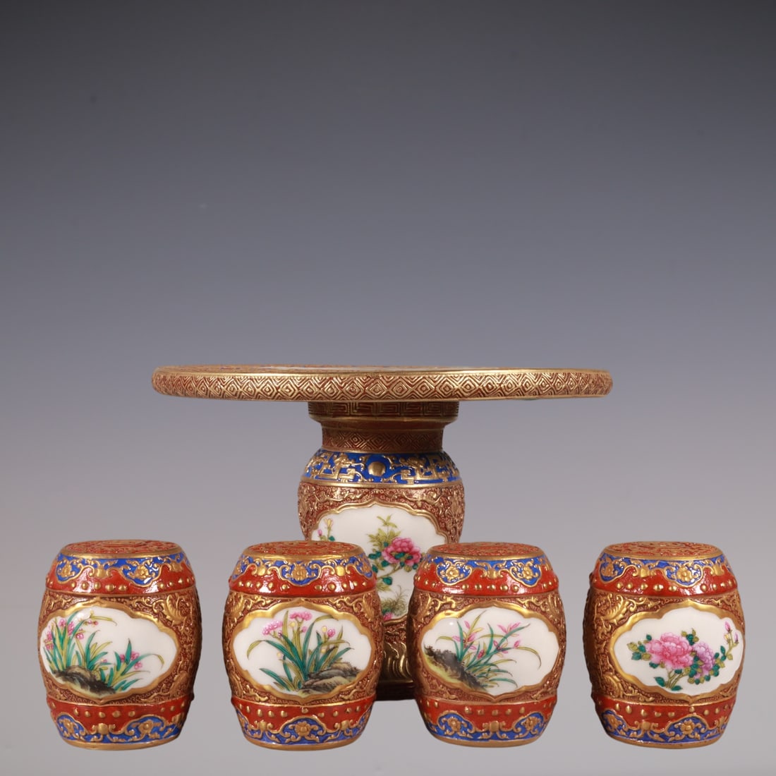 A Set of Fine Enamel Painted Gold Lotus Pattern Flower and Bird Pattern Table Stool: A Set of Fine Enamel Painted Gold Lotus Pattern Flower and Bird Pattern Table Stool Qing Dynasty, China Qianlong Six-character Mark Size:13.6cmx19.6cm Size:6.8cmx5cm (The Dimensions Of All Batches