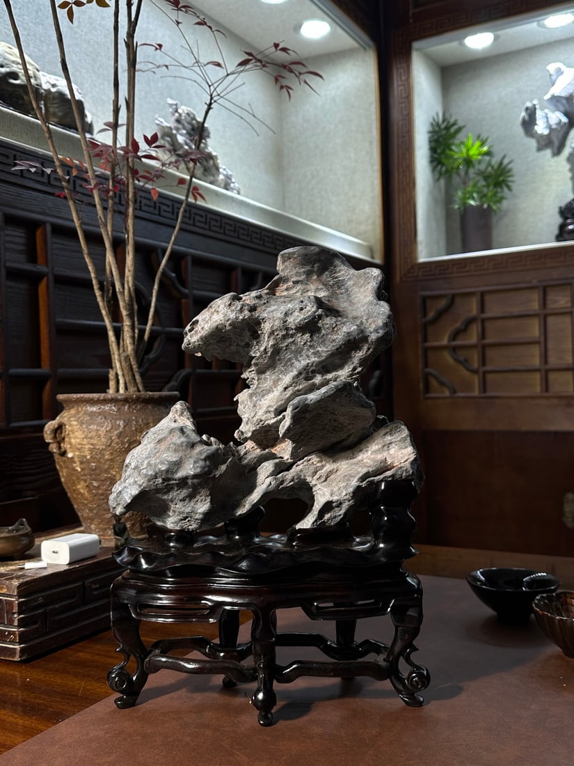 An Exquisite Lingbi Stone Ornament: An Exquisite Lingbi Stone Ornament Qing Dynasty, China Size:36cmx24cmx13cm (The Dimensions Of All Batches Are Manually Measured.If You Need More Detailed Information, Please Contact Our Customer