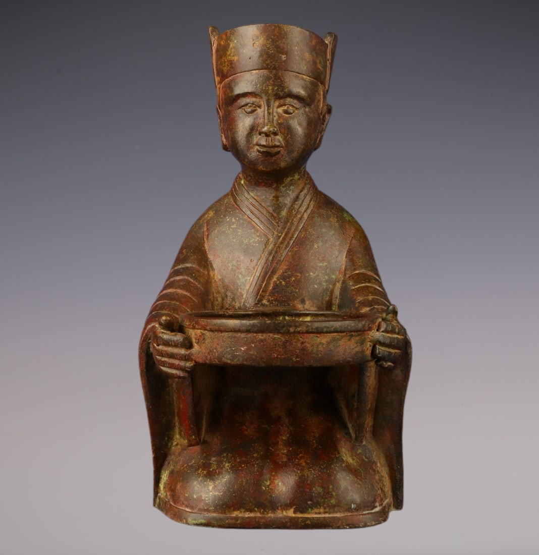 An Exquisite Bronze With Inscription Figure-Shaped Candlestick: An Exquisite Bronze With Inscription Figure-Shaped Candlestick Han Dynasty, China Size:17cmx25cm Weight:2200g (The Dimensions Of All Batches Are Manually Measured.If You Need More Detailed