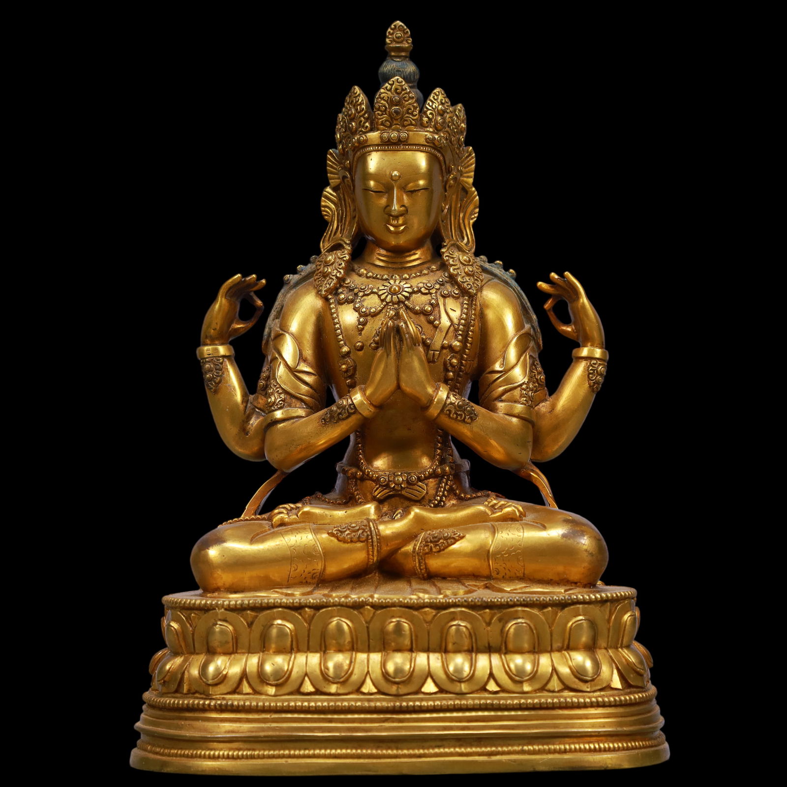 An Exquisite Gilt Bronze Four-arms Statue of Avalokitesvara: An Exquisite Gilt Bronze Four-arms Statue of Avalokitesvara Ming Dynasty, China Size:14.5cmx9.5cmx21cm Weight:1750g (The Dimensions Of All Batches Are Manually Measured.If You Need More Detailed