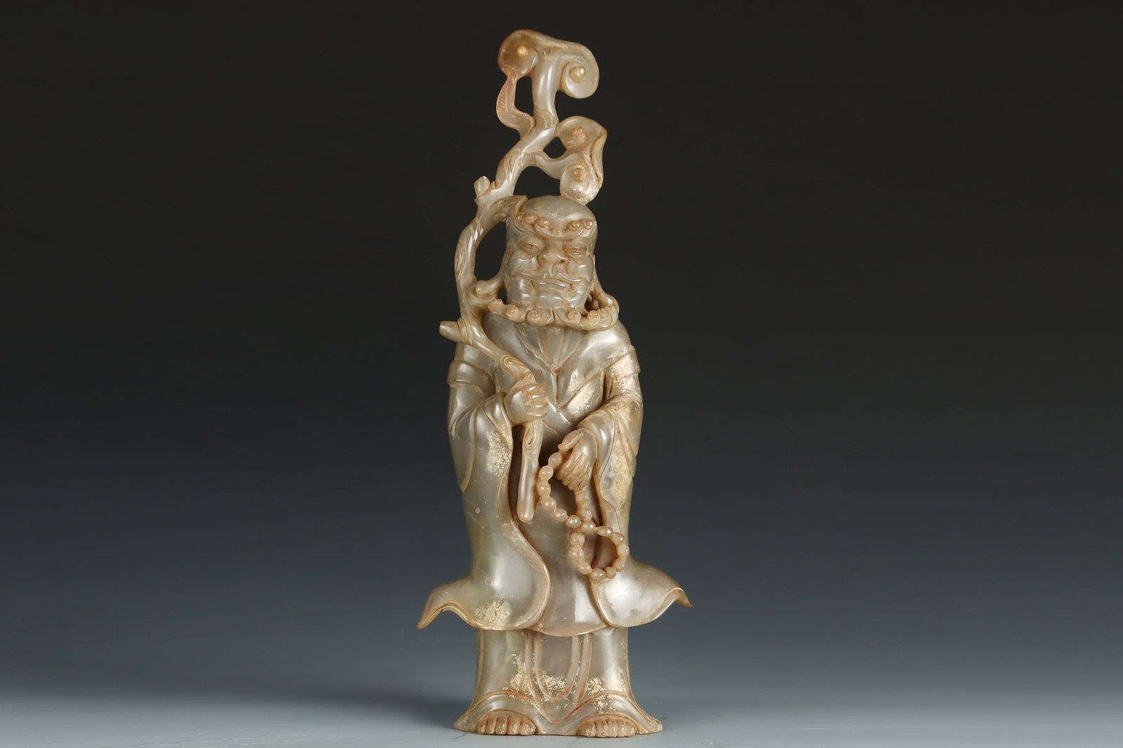 An Exquisite White Jade Statue of Dharma Ornament: An Exquisite White Jade Statue of Dharma Ornament Qing Dynasty, China Size:36cmx14cm Weight:2898g (The Dimensions Of All Batches Are Manually Measured.If You Need More Detailed Information, Please