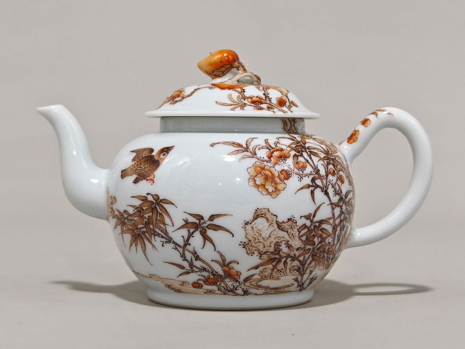 An Exquisite Ink Color Flower and Bird Pattern Teapot: An Exquisite Ink Color Flower and Bird Pattern Teapot Qing Dynasty, China Yongzheng Four-character Mark Size:8.5cmx14cm (The Dimensions Of All Batches Are Manually Measured.If You Need More