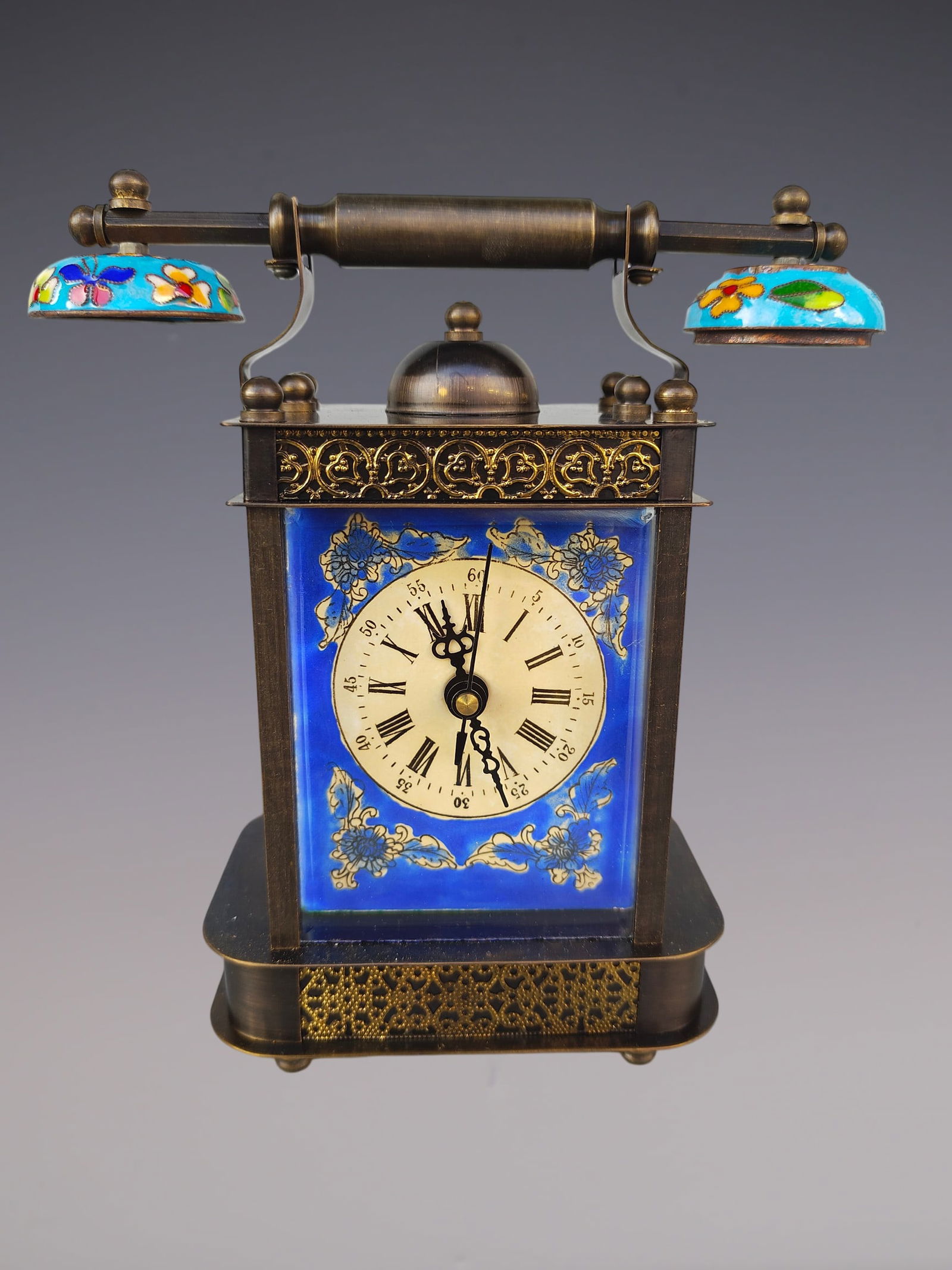 An Exquisite Bronze Lotus Pattern Clock: An Exquisite Bronze Lotus Pattern Clock Qing Dynasty, China Size:9cmx18cmx20cm (The Dimensions Of All Batches Are Manually Measured.If You Need More Detailed Information, Please Contact Our Customer S