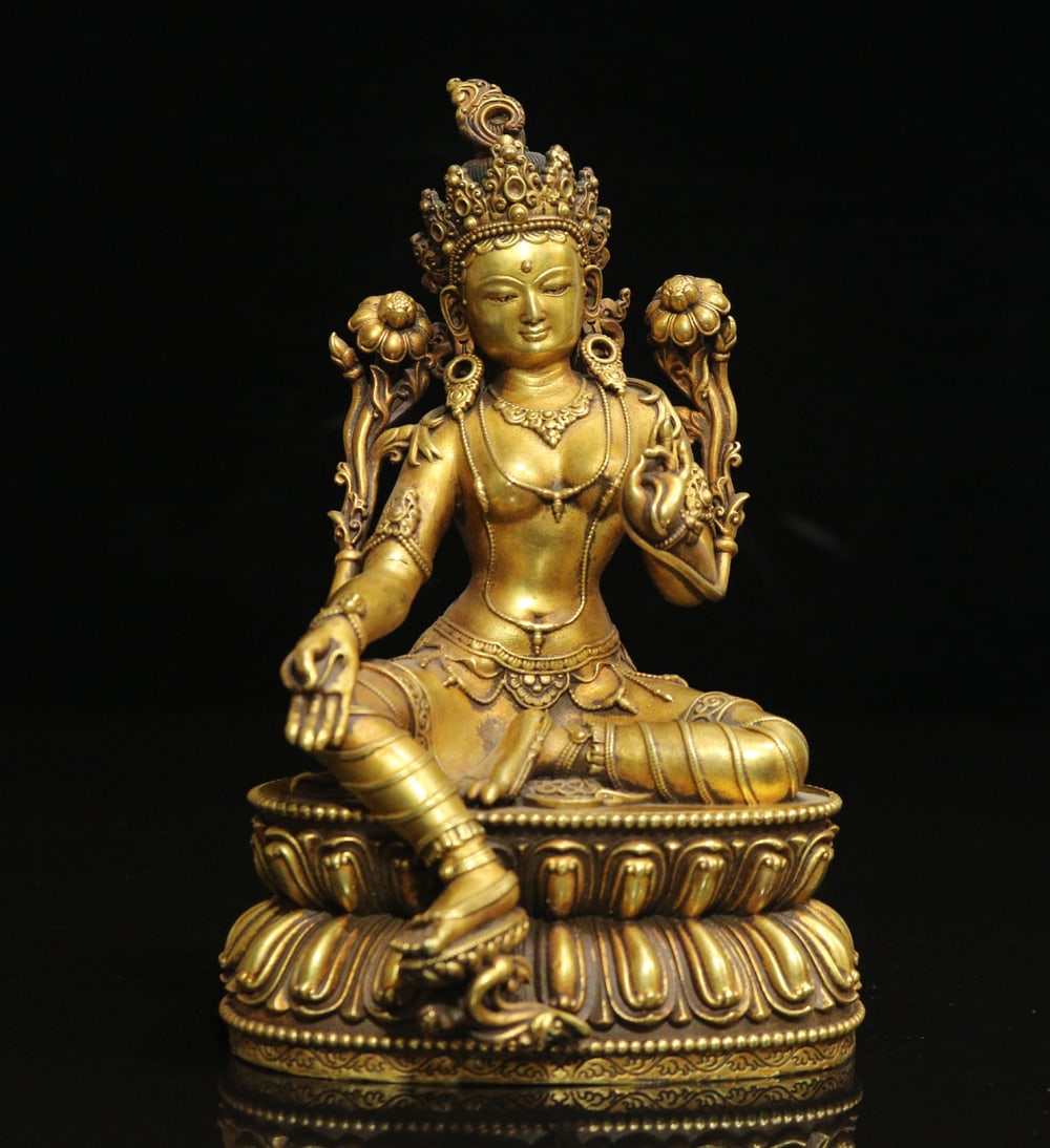 An Exquisite Gilt Bronze Statue of Tara Ornament: An Exquisite Gilt Bronze Statue of Tara Ornament Ming Dynasty, China Yongle Six-character Mark Size:15cmx10cmx7cm Weight:1399g (The Dimensions Of All Batches Are Manually Measured.If You Need More