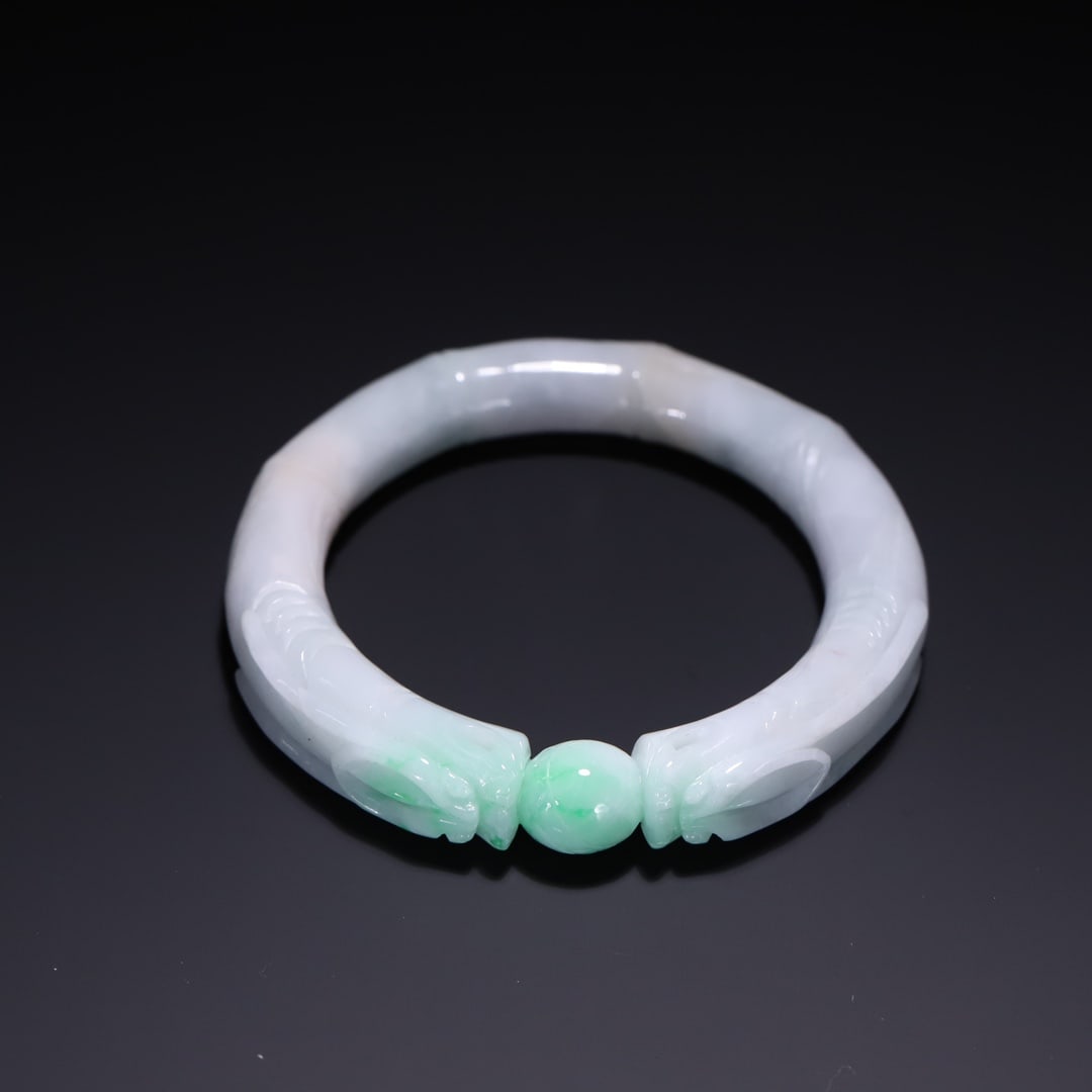 An Exquisite Jadeite Bracelets: An Exquisite Jadeite Bracelets Qing Dynasty, China Size:(inside diameter)5.6cm Weight:69.08g (The Dimensions Of All Batches Are Manually Measured.If You Need More Detailed Information, Please