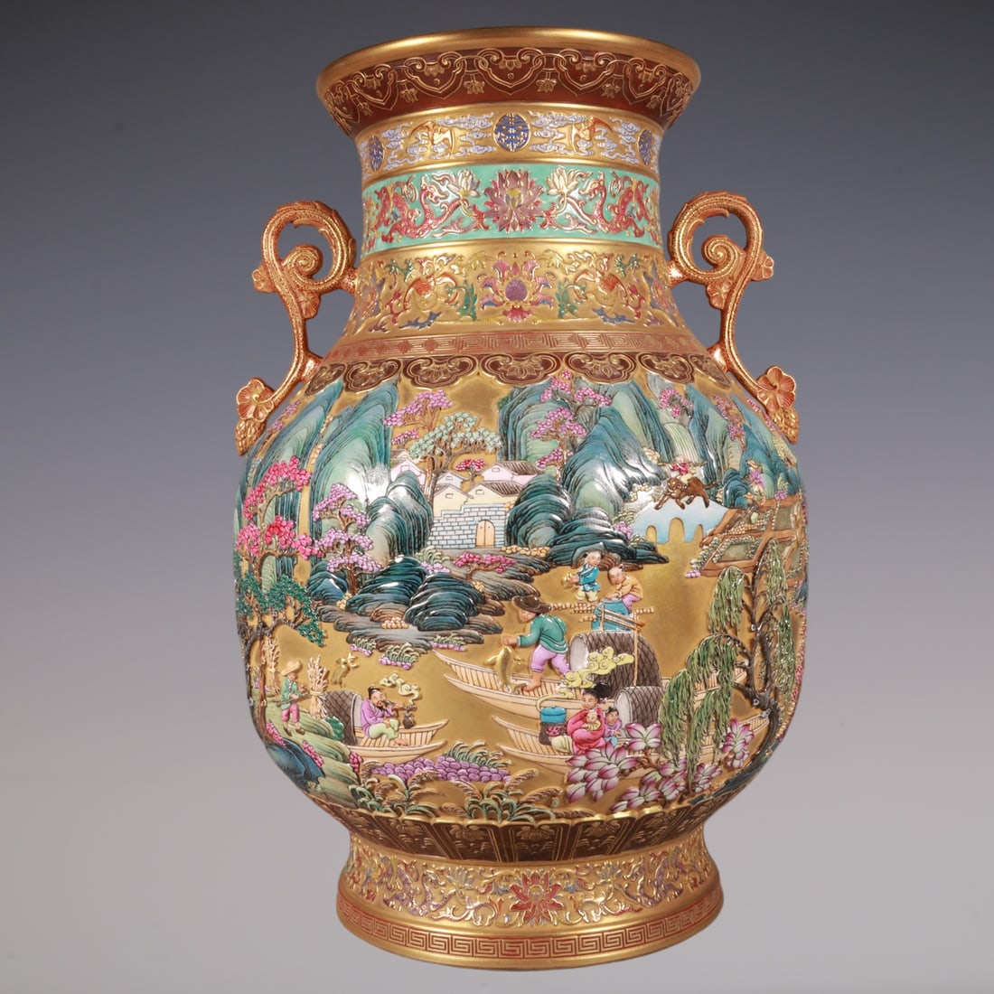 An Exquisite Enamel Lotus Pattern Landscape and Figure Pattern Double-Ears Vase: An Exquisite Enamel Lotus Pattern Landscape and Figure Pattern Double-Ears Vase Qing Dynasty, China Qianlong Six-character Mark Size:45cmx29cm (The Dimensions Of All Batches Are Manually