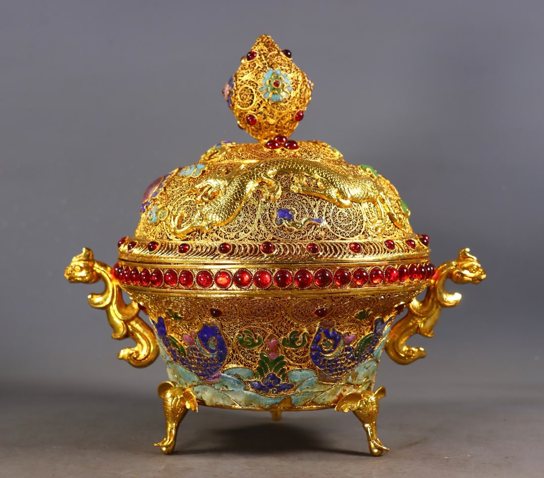 An Exquisite Gilt Bronze Inlaid Gems Dragon Pattern Double-Ears and Tripod Censer: An Exquisite Gilt Bronze Inlaid Gems Dragon Pattern Double-Ears and Tripod Censer Qing Dynasty, China Qianlong Four-character Mark Size:23cmx23.5cmx18cm Weight:1188g (The Dimensions Of All Batches