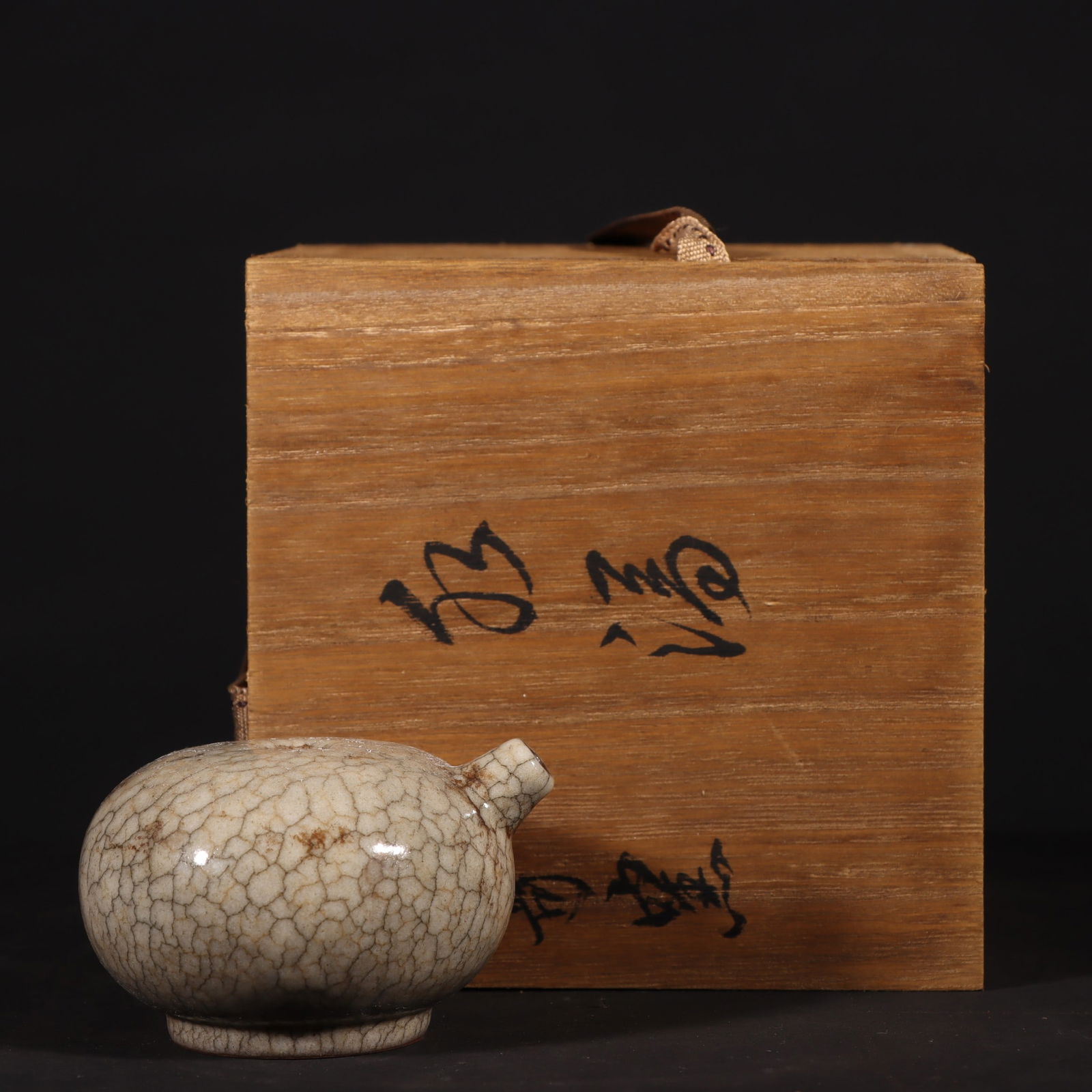 An Exquisite Ge yao Water Pot: An Exquisite Ge yao Water Pot Song Dynasty, China Size:4.8cmx8cm (The Dimensions Of All Batches Are Manually Measured.If You Need More Detailed Information, Please Contact Our Customer Service Before