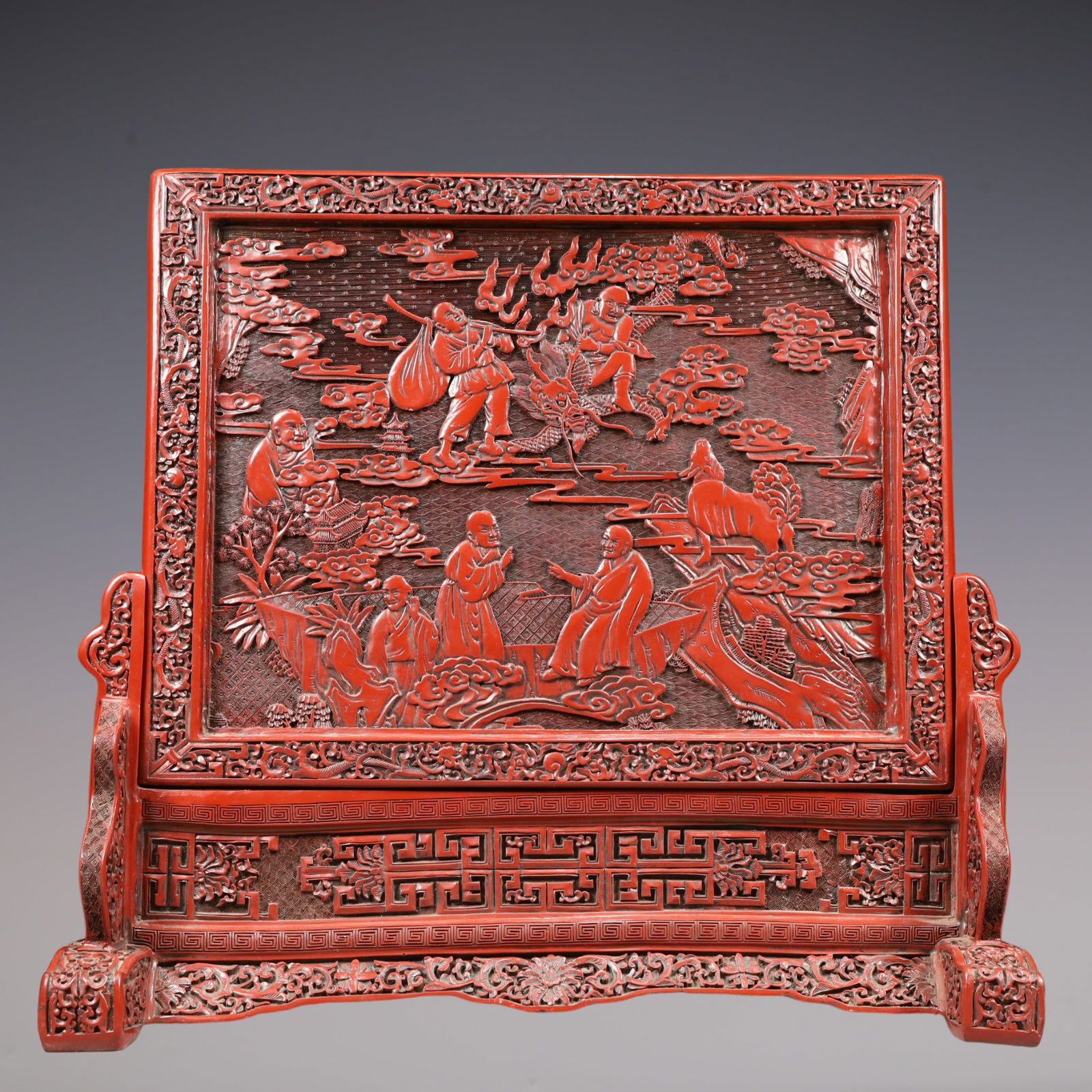 A Exquisite Carved Red Lacquer Lotus Pattern Character and Story Pattern Screen: A Exquisite Carved Red Lacquer Lotus Pattern Character and Story Pattern Screen Qing Dynasty, China Qianlong Six-character Mark Size:52cmx18cmx49cm Weight:5550g (The Dimensions Of All Batches Are