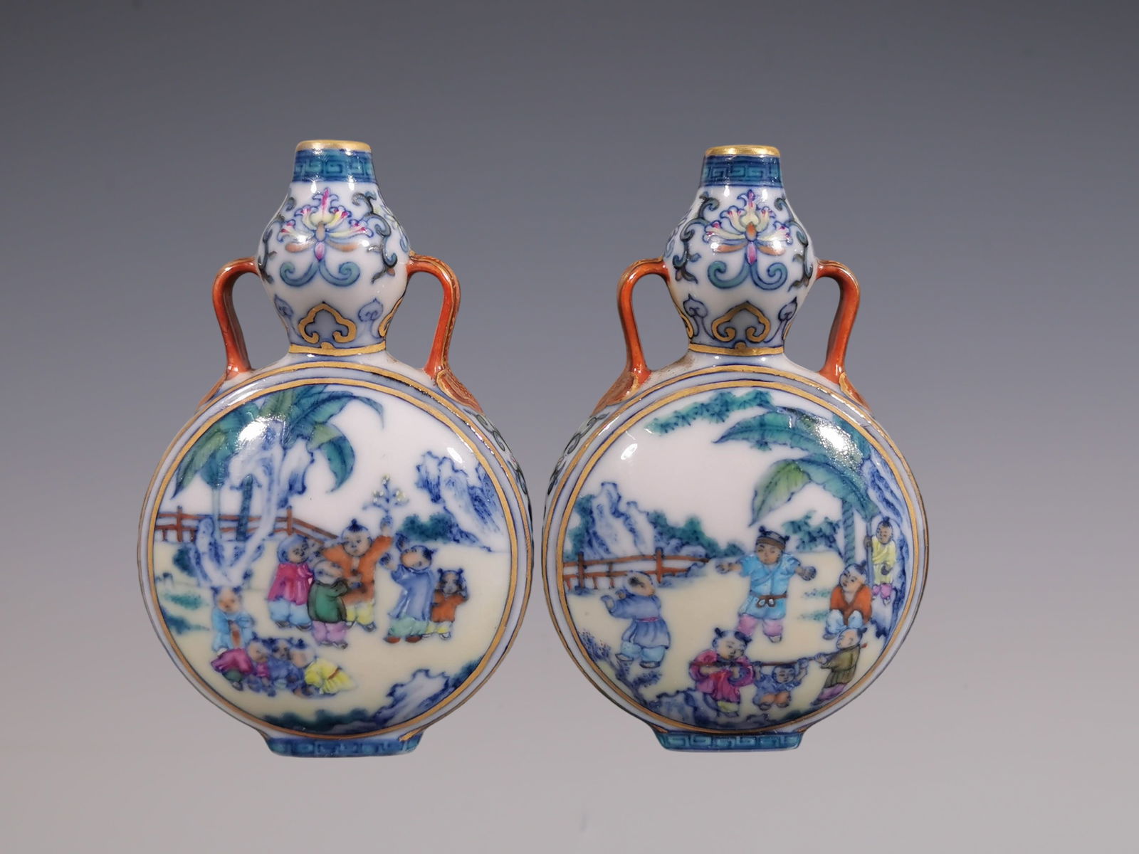 An Exquisite Blue and White Doucai Lotus Pattern Character and Story Pattern Gourd-Shaped: An Exquisite Blue and White Doucai Lotus Pattern Character and Story Pattern Gourd-Shaped Double-Ears Vase Qing Dynasty, China Qianlong Four-character Mark Size:8.8cmx6cm (The Dimensions Of All